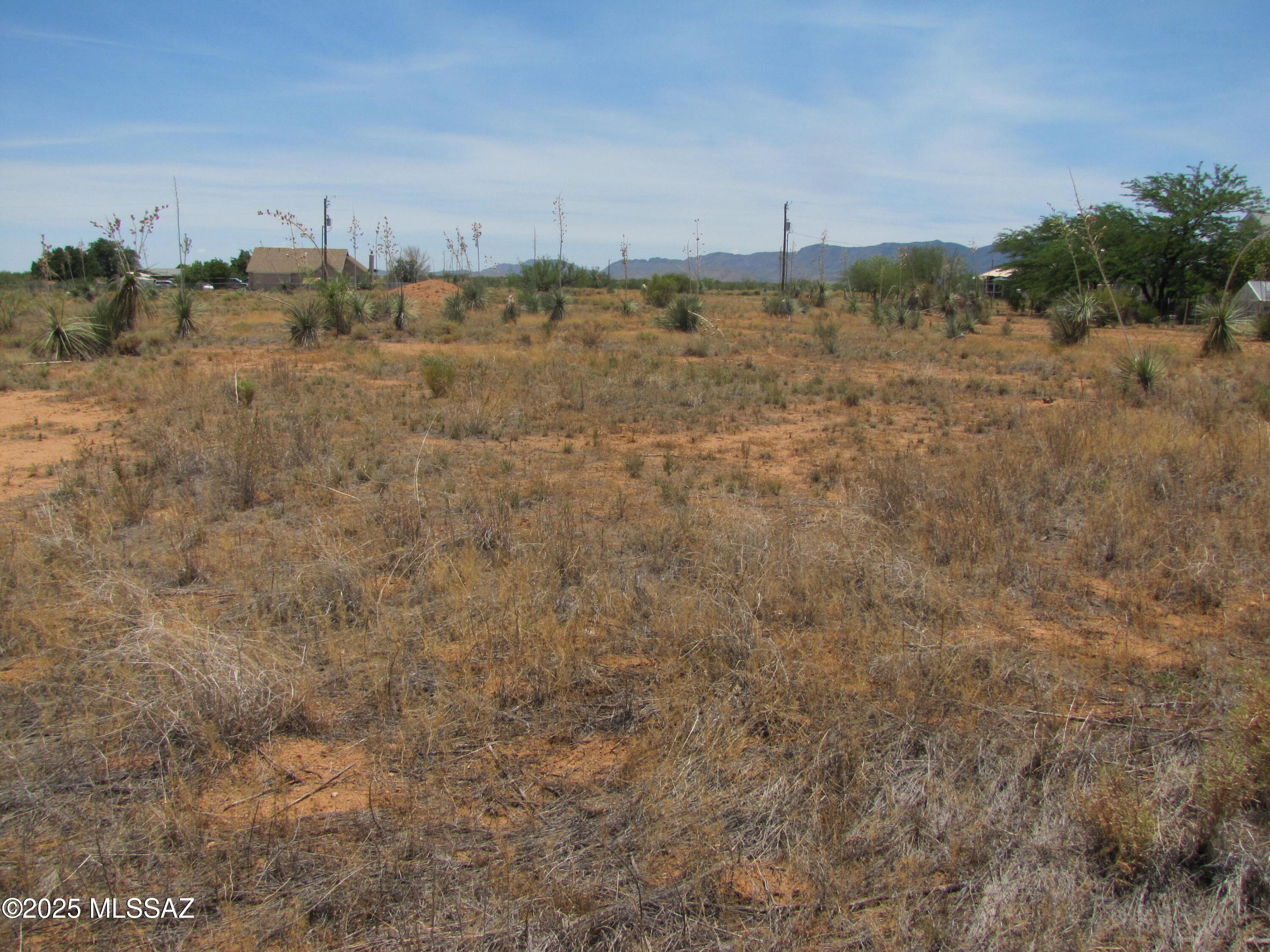SEPTIC ALREADY INSTALLED, ELECTRIC TO LOT LINE, WATER TO LOT LINE ....waiting for you to build your dream home! This 0.85ac parcel is located on a County maintained road, just a little more than 1 mile to paved road and easy access to Hwy 191 and Interstate 10. Only a few minutes from the friendly village of Sunsites with its amenities. And don't forget the incredible view of Cochise Stronghold and the Dragoon Mountains!