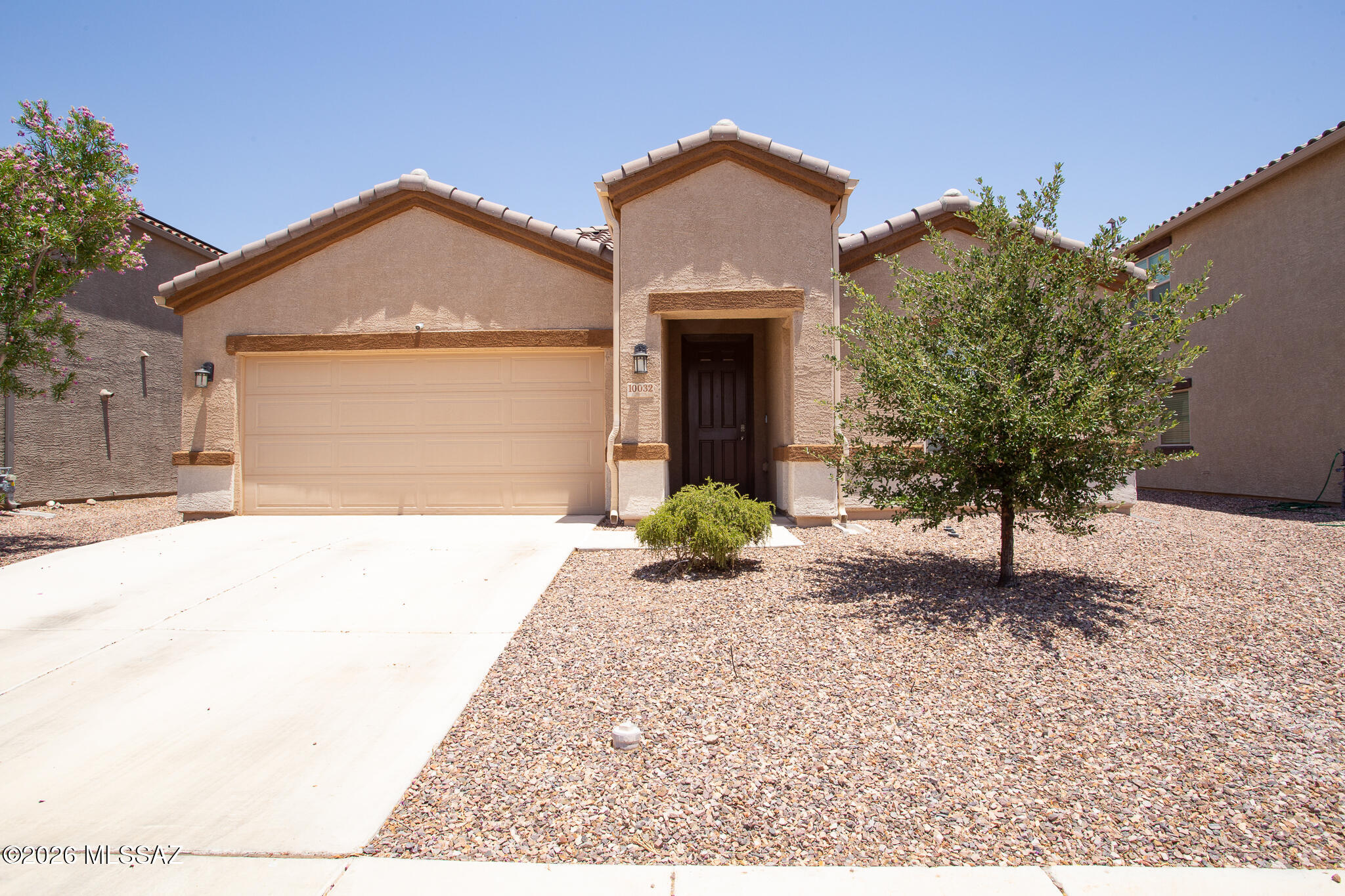 Welcome home to this beautiful 4 bedroom, 2 bath home in the highly desirable Saguaro Bloom community, ideally situated directly across from the neighborhood park. Offering 1,823 sq. ft. of thoughtfully designed living space, this home combines comfort, style and convenience.
The spacious kitchen is perfect for everyday living and entertaining, featuring abundant cabinetry, granite countertops, stainless steel appliances and breakfast bar. The inviting primary suite offers a private retreat with dual sinks,  walk-in shower and a generous walk-in closet.
Step outside to the covered patio and enjoy the low maintenance backyard an ideal space for relaxing or entertaining. Additional features include a dedicated laundry room and a 2 car garage. Conveniently located near shopping, restaurants, parks and more, this move-in ready home have everything you've been looking for. Don't miss your opportunity to make it yours. Schedule your showing today!