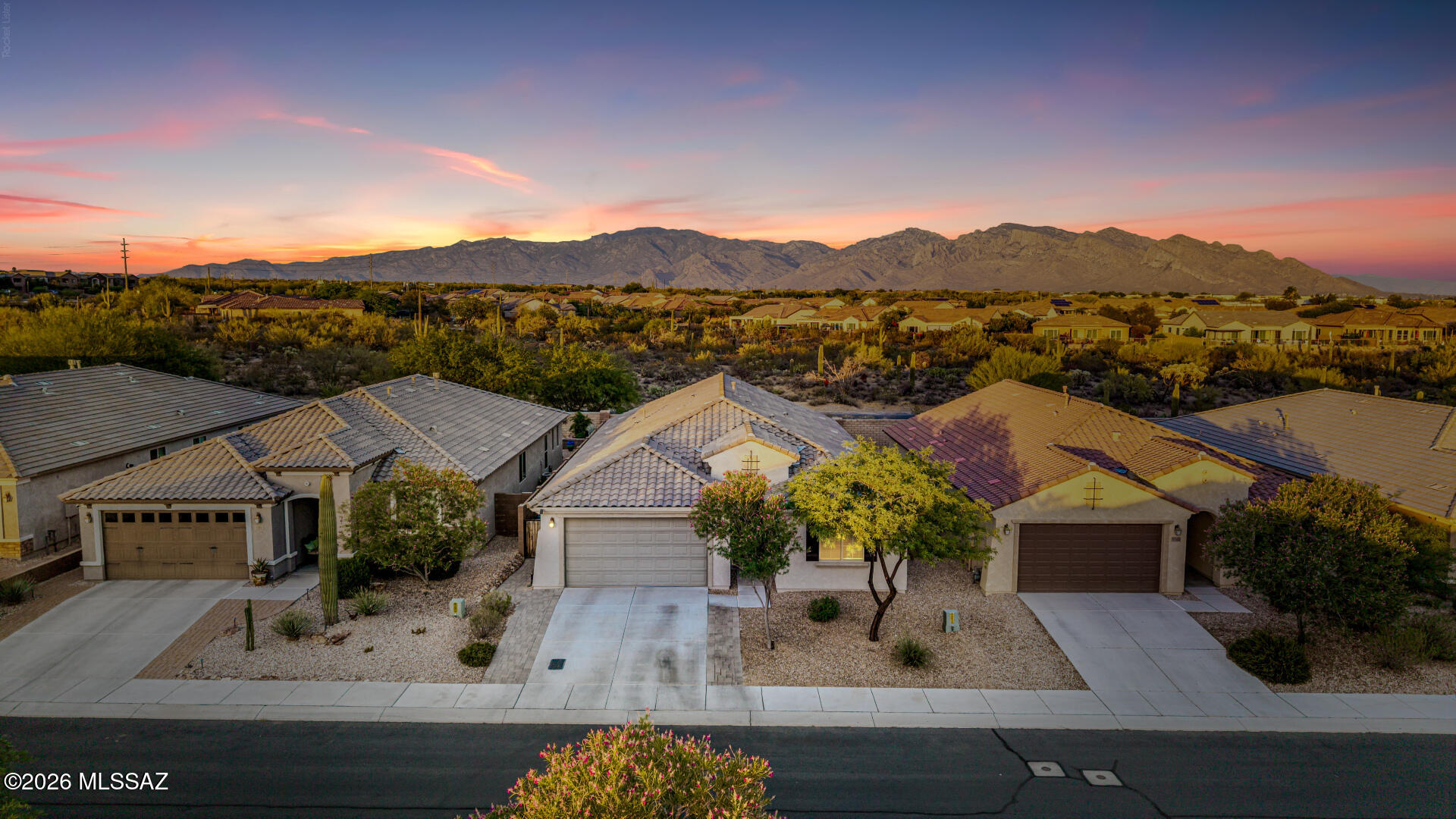 Beautiful home in Tangerine Ridge with breathtaking mountain views! This spacious open-concept floor plan offers a private home office and a desirable split-bedroom layout with separate guest quarters, perfect for visitors or multigenerational living. Enjoy Arizona living year-round on the large covered patio. Conveniently located close to shopping, amazing dining options, and situated in the highly sought-after Marana School District. A fantastic combination of comfort, functionality, and location.