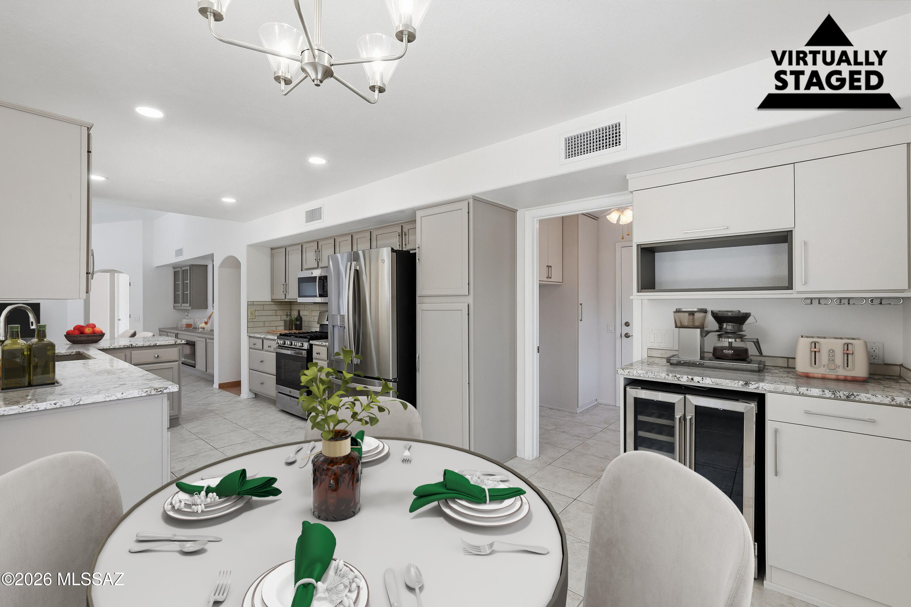 Welcome to Sun City Oro Valley, where resort-style 55+ living meets comfort & convenience. This beautifully remodeled, light-filled home offers a spacious 1,775 sq. ft. floor plan and over $75,000 in recent upgrades. Enjoy a stunning updated kitchen with granite countertops, newer appliances, stylish lighting, built-in desk, and fresh paint throughout. The inviting living area features a new fireplace insert, while both bathrooms have been tastefully updated with contemporary finishes. Bright, open living spaces flow seamlessly to a private backyard with no rear neighbors, providing exceptional privacy and peaceful desert sunsets. Enjoy access to golf, pools, fitness centers, pickleball, clubs, and endless social activities. Move-in ready and beautifully updated, this exceptional home.
