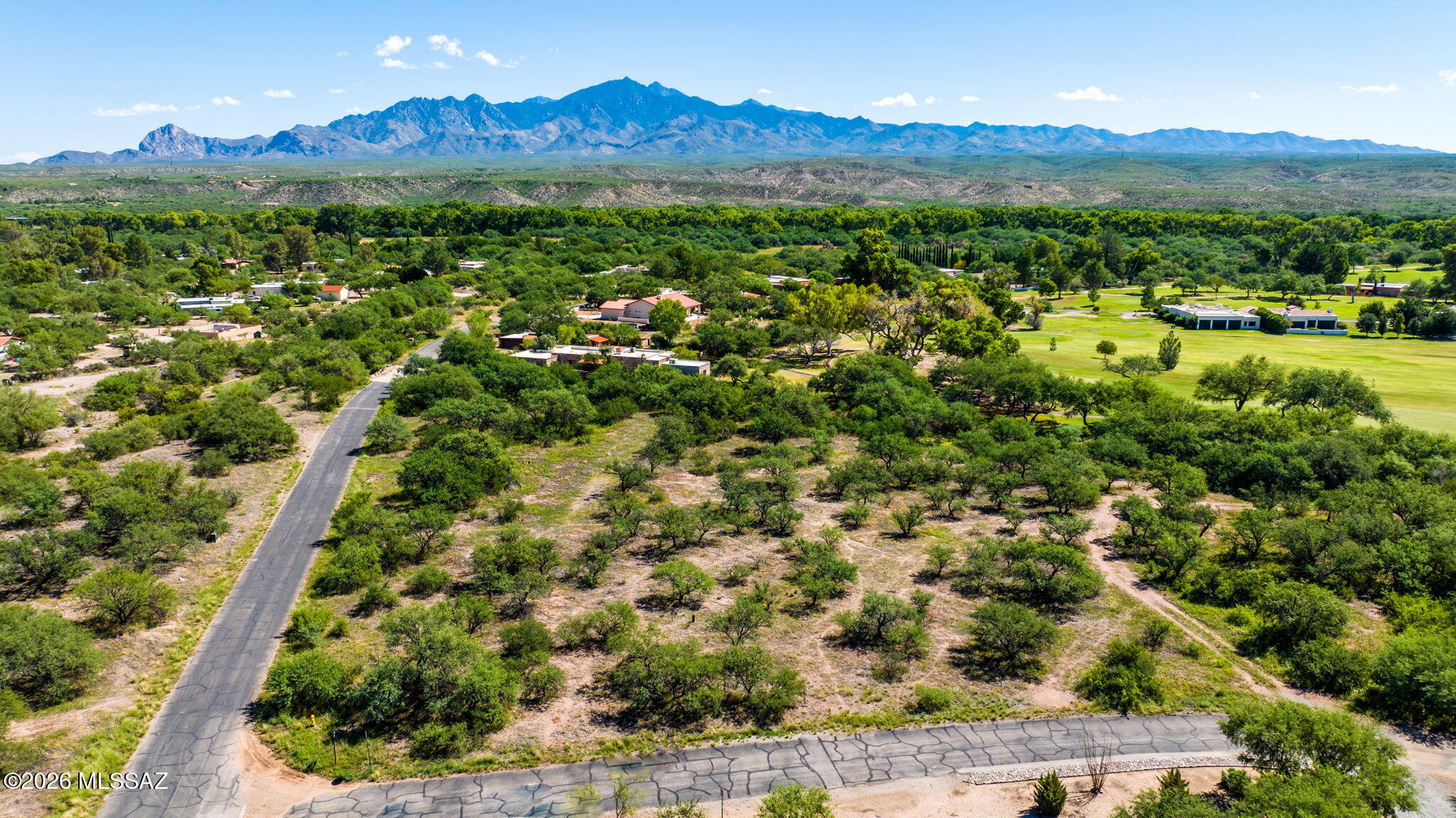 Discover an exceptional 1.01-acre parcel in Tubac Valley Country Club Estates. Nestled on the Tubac golf course, this vacant land has stunning mountain views of the Santa Ritas. With a capped well, natural gas, and electric to the lot line it's a canvas for your dream home. Experience desert charm, Tubac's art scene, and tranquil living.