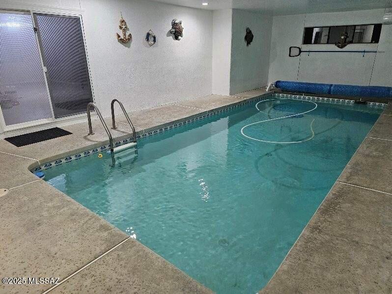 Unique!!  Indoor, heated pool. Spacious 3 bedroom, 2 bath home with all appliances. all on .49 acre.  No carpet. Cul-de-sac lot. Spectacular sunset views.  Solar in an all electric home!   Owner is a Licensed Real Estate Agent / Broker in the state of Arizona.  No Pets.  Krasnick Realty represents the Landlord only for the purposes of this listing.
