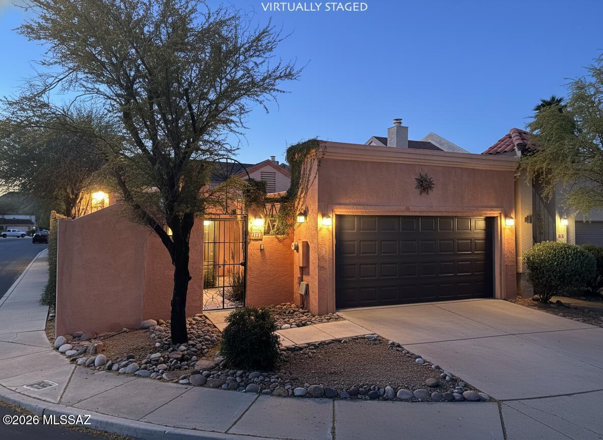 Tucked into a convenient corner in the heart of Tucson, this charming townhome offers a lifestyle that blends comfort, privacy, and everyday ease. Located near St. Mary's Hospital, you're just minutes from some of the city's best local spots--those hidden gem, hole-in-the-wall restaurants Tucson is known for--along with shopping and quick freeway access that makes getting anywhere in town effortless.

Set on a desirable corner lot, this home offers a sense of space and privacy that's hard to find. The higher surrounding walls create a peaceful, tucked-away feel, while the unique carport design--open on one side--flows seamlessly into a fully enclosed yard, complete with a garage-style exterior door for added convenience and flexibility. Inside, just under 1,000 square feet is thoughtfully designed to feel both comfortable and functional, making it the perfect fit for those who value low-maintenance living without sacrificing character. Whether you're enjoying a quiet evening at home, stepping out to explore nearby local favorites, or commuting with ease, this home supports a lifestyle that's both relaxed and connected.