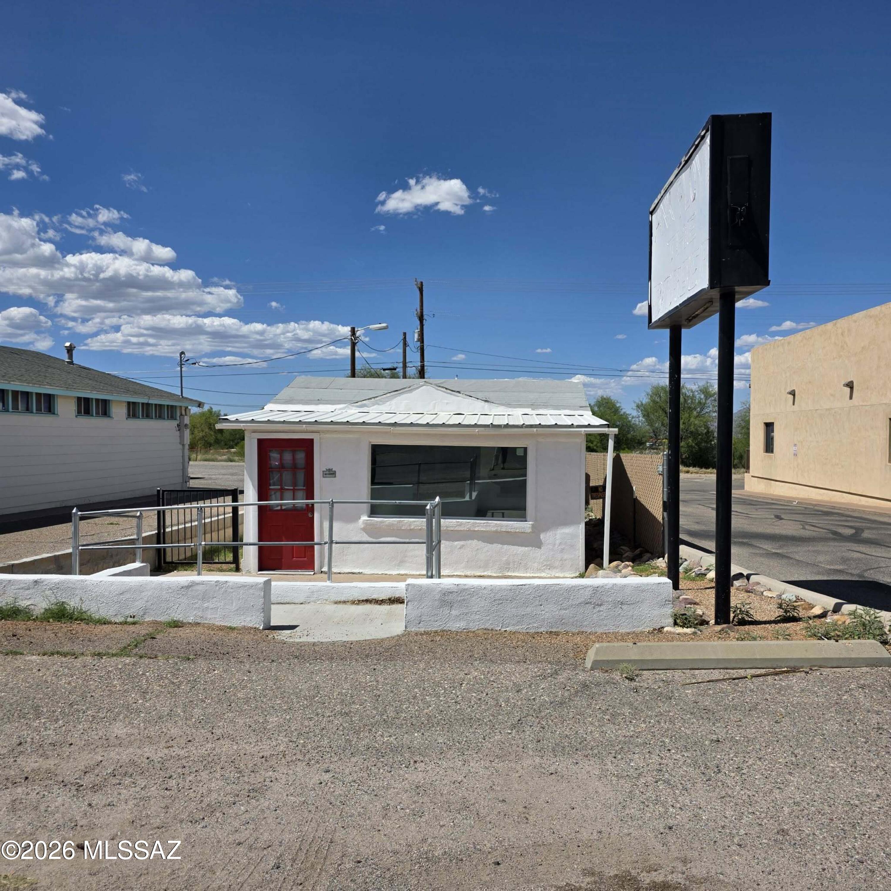 Discover an incredible opportunity for an entrepreneur or investor looking to step into a perfectly outfitted space in Benson, AZ. This standalone commercial building spans 632 square feet on a 0.08-acre lot and was recently updated and meticulously built out to operate as a successful shaved ice store. The building features an efficient layout designed for high-volume customer service, complete with modern mini-split heating and cooling systems to keep operations cool. Originally built in 1963, the property features General Business (GB) zoning, low annual taxes, and reliable SSVEC power. Located just off I-10.