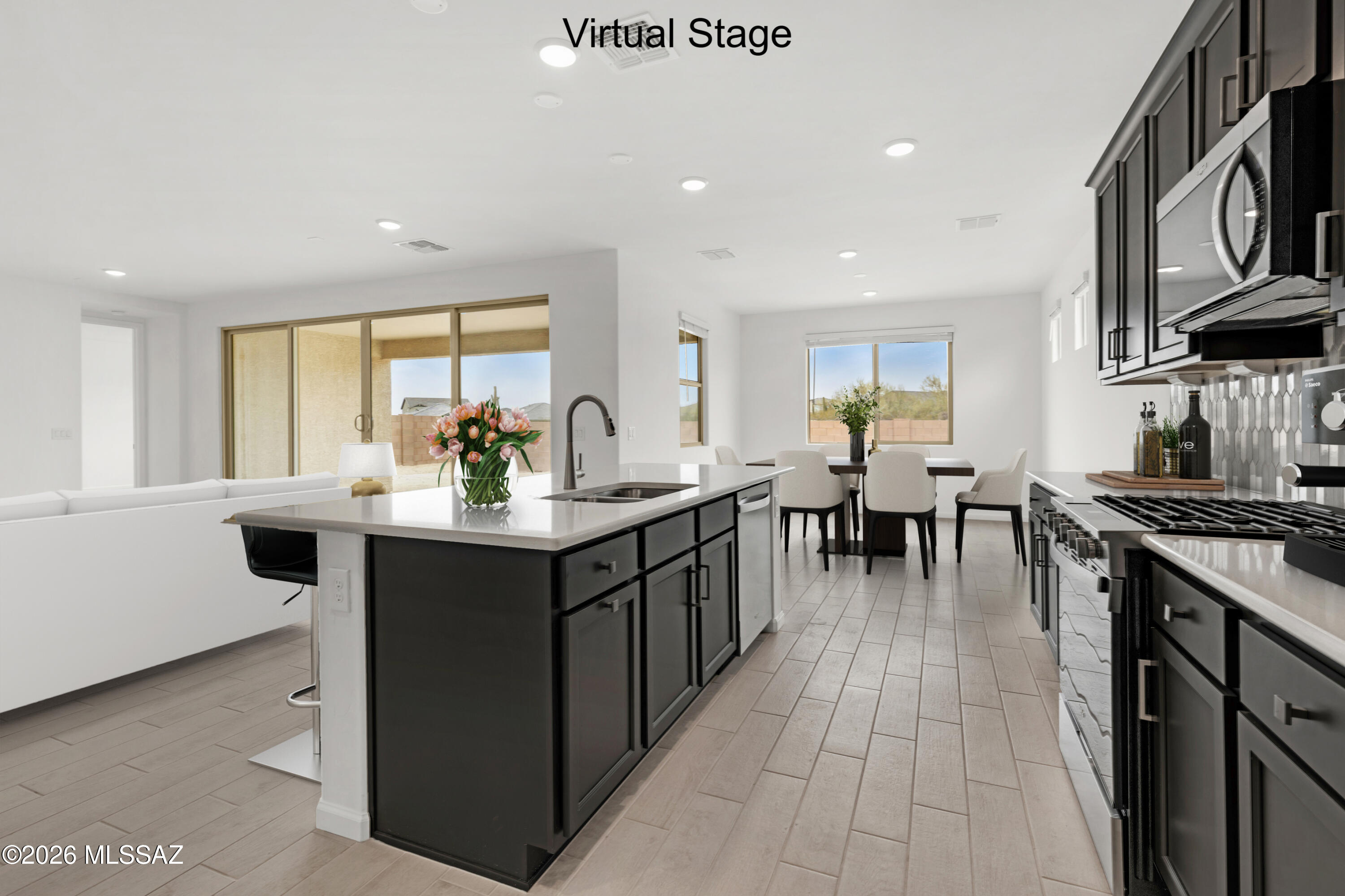 Auburn plan with Spanish elevation. Welcome to your dream home featuring open Greatroom concept with Flex room. Here the heart of your home seamlessly blends the living, dining, and kitchen areas. The stylish kitchen boasts 42'' upper cabinets, gas range, quartz countertops, center island & spacious corner walk-in pantry. Owner's suite features huge walk-in closet, vanity with twin sinks, linen closet & walk-in shower. Enjoy the pleasure of outdoor gatherings on the covered back patio. Includes 8' interior doors, Whirlpool Refrigerator, Washer/Dryer, faux wood blinds! Est completion April '26.