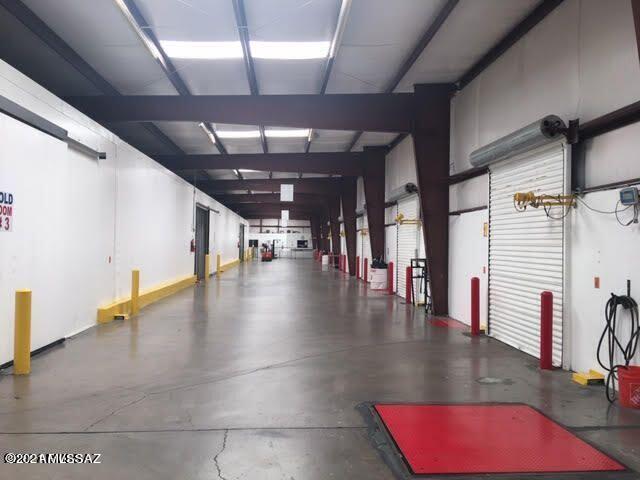 Great produce distribution warehouse for lease! Exclusive immaculate warehouse with 22,000 sq.ft. of which 10,000 SF is cold, and approximately 2,000 sq.ft. is office. Warehouse is equiped with Camera system, Aerocide units in cold rooms, truck scales in yard and floor scale in warehouse. You have nine loading door and 2 large access doors with ramp. Yard is totally fenced and secure. What more do you want? Property is Co-listed with Nanci Pottinger of Noginan Real Estate. [520-839-5040] Call Karen or Nanci for your appointment today.