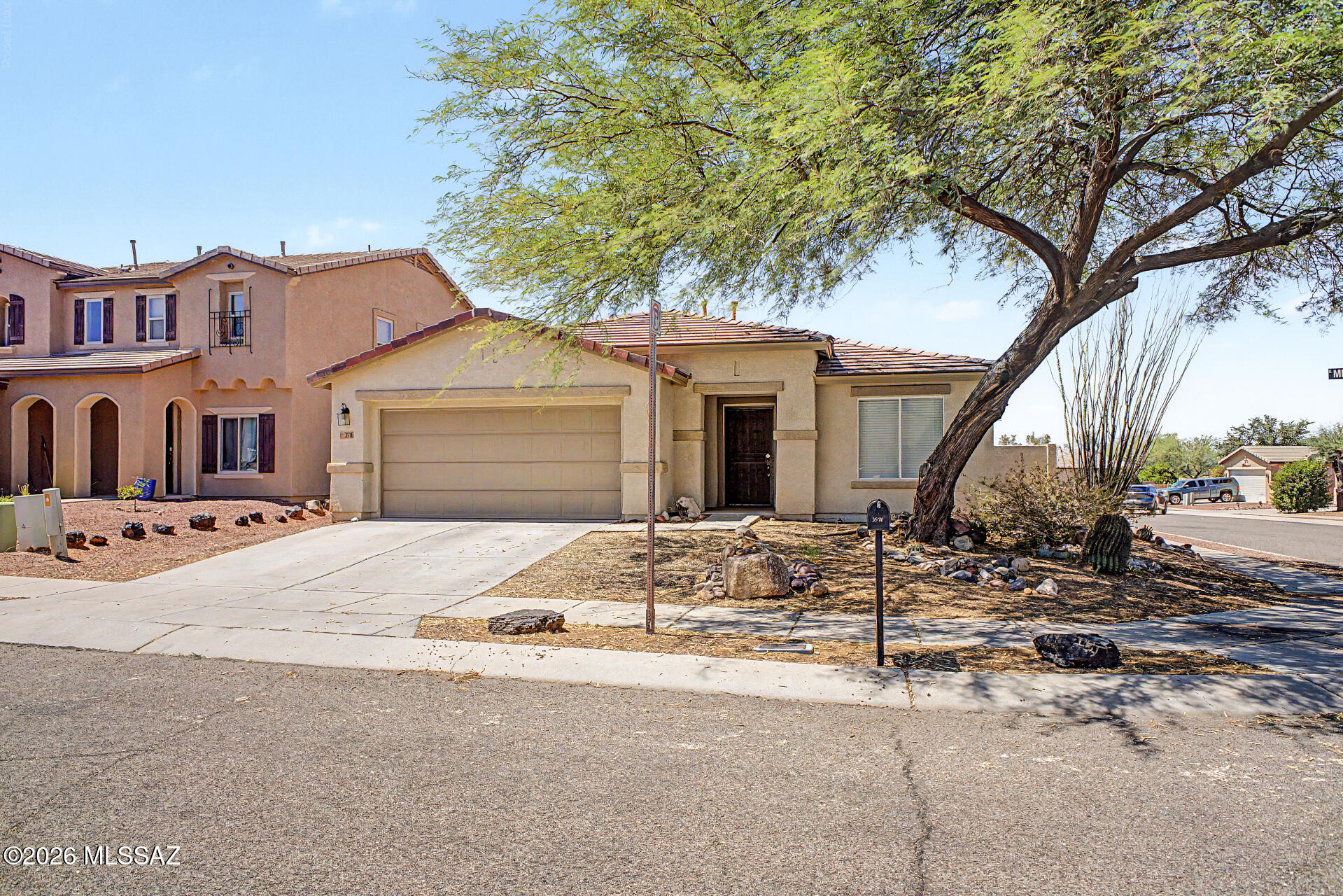 Welcome to this beautifully updated home in the desirable Black Horse community! Featuring a modern open-concept floorplan with fresh interior paint, LVP and new carpet in the bedrooms, this home offers a clean and stylish feel from the moment you enter. The kitchen showcases crisp white cabinets, stainless steel appliances, and a seamless flow into the main living areas. Enjoy the comfort of ceiling fans, a spacious laundry room, and a primary suite complete with a dual vanity bathroom. Outside, relax in the low-maintenance desert landscaped backyard, perfect for enjoying the outdoors. Complete with a 2-car garage, this move-in-ready home combines modern upgrades, convenience, and community charm!