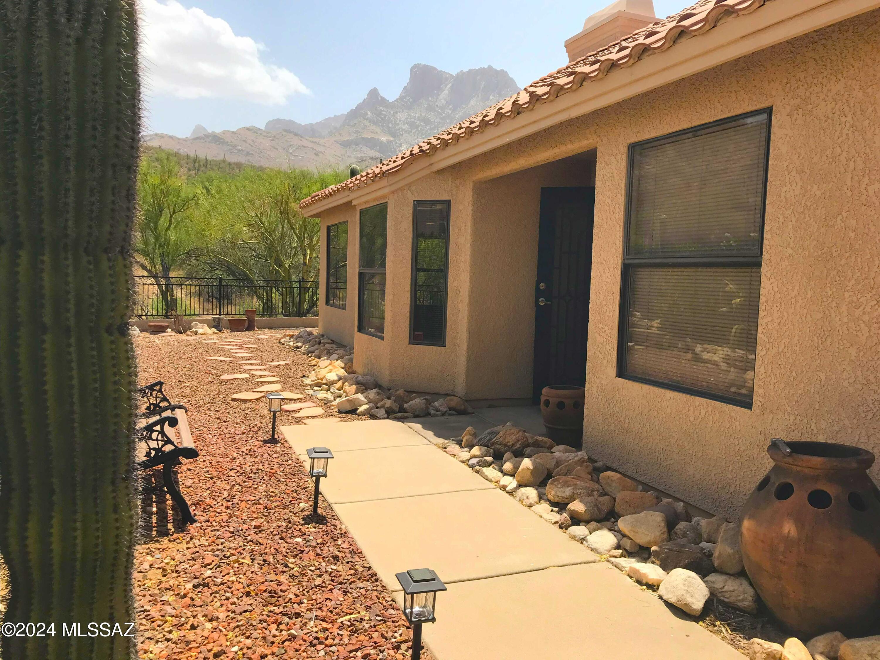This Charming Updated home features 3br/2 baths situated in desirable guard gated La Reserve Community w/ Million Dollar Mountain Views. Includes Landscaping & Pest Control. Bright Open Living Room w/ gas fireplace. Newer Carpet in Master BR & 1 Guest BR. Elegant Kitchen has quartz countertops, tiled backsplash, built in SS microwave, SS dishwasher, disposal, SS gas range, pantry & wine fridge. Master Bedroom features walk-in closet. Ensuite has beautiful frosted barn doors, new tile floor, double vanities & a walk-in shower. Laundry closet in hallway w/ washer/dryer. East facing low care backyard w/ covered porch. Close To Shopping & Restaurants W/ Quick Access To Major Employers. Min 12 month lease. Non-Smoking Property. Renter's Insurance required. Sorry No Cats. Up to 2 small dogs