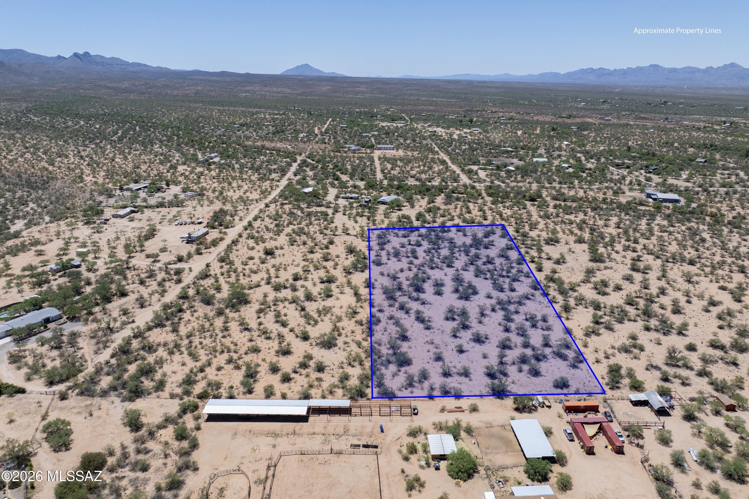 Discover the beauty and tranquility of Southern Arizona with this rare 5-acre parcel in Elephant Head, to be split during escrow. Well water is available through a well share with only 1 other property. Nestled among rolling grasslands and mature mesquite trees, this property offers breathtaking mountain views, wide open skies, and endless possibilities. Build your dream home, create a private retreat, or invest in peaceful country living while still enjoying convenient access to I-19, Tubac, and Tucson. Enjoy stunning sunsets, star-filled nights, and the serenity of rural living with plenty of space for horses, gardens, or recreational use. A perfect blend of privacy and accessibility awaits!