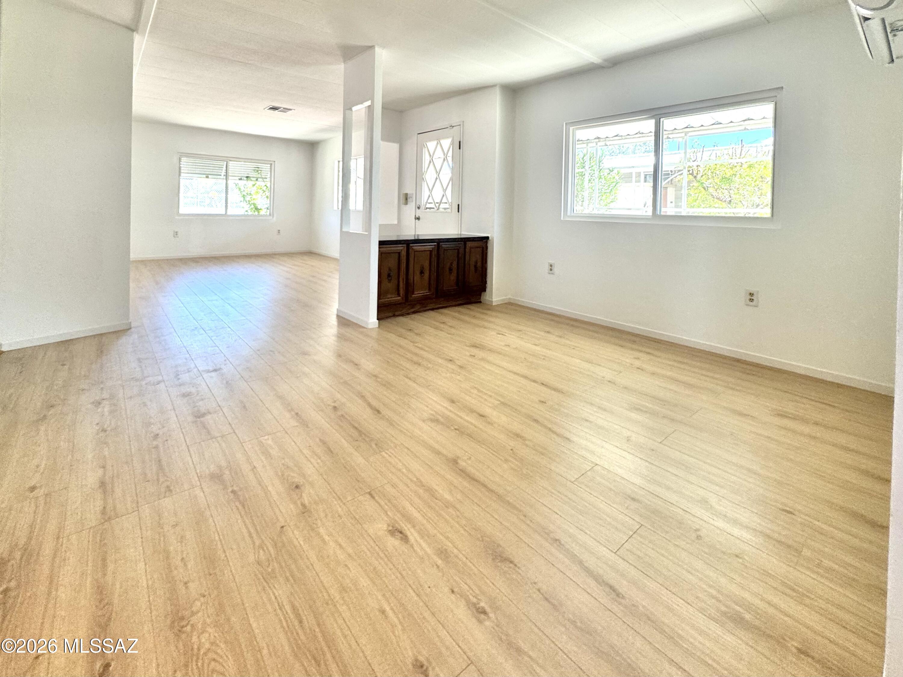 Great opportunity to own a lake view home in desirable Swan Lake Estates. Enjoy peaceful water views and the ability to fish right around the corner. This home offers solid potential and is ready for your personal updates and cosmetic refresh.

Gated community amenities include pickleball, horseshoes, bocce ball, shuffleboard, spa, two pools, billiards, library, two clubhouses, and an exercise room. Lot rent covers water, sewer, and trash.

Convenient central Tucson location near restaurants, shopping, medical services, Tucson Mall, and the Auto Mall. Ideal for snowbirds or anyone seeking an active, low-maintenance lifestyle with beautiful lake views.