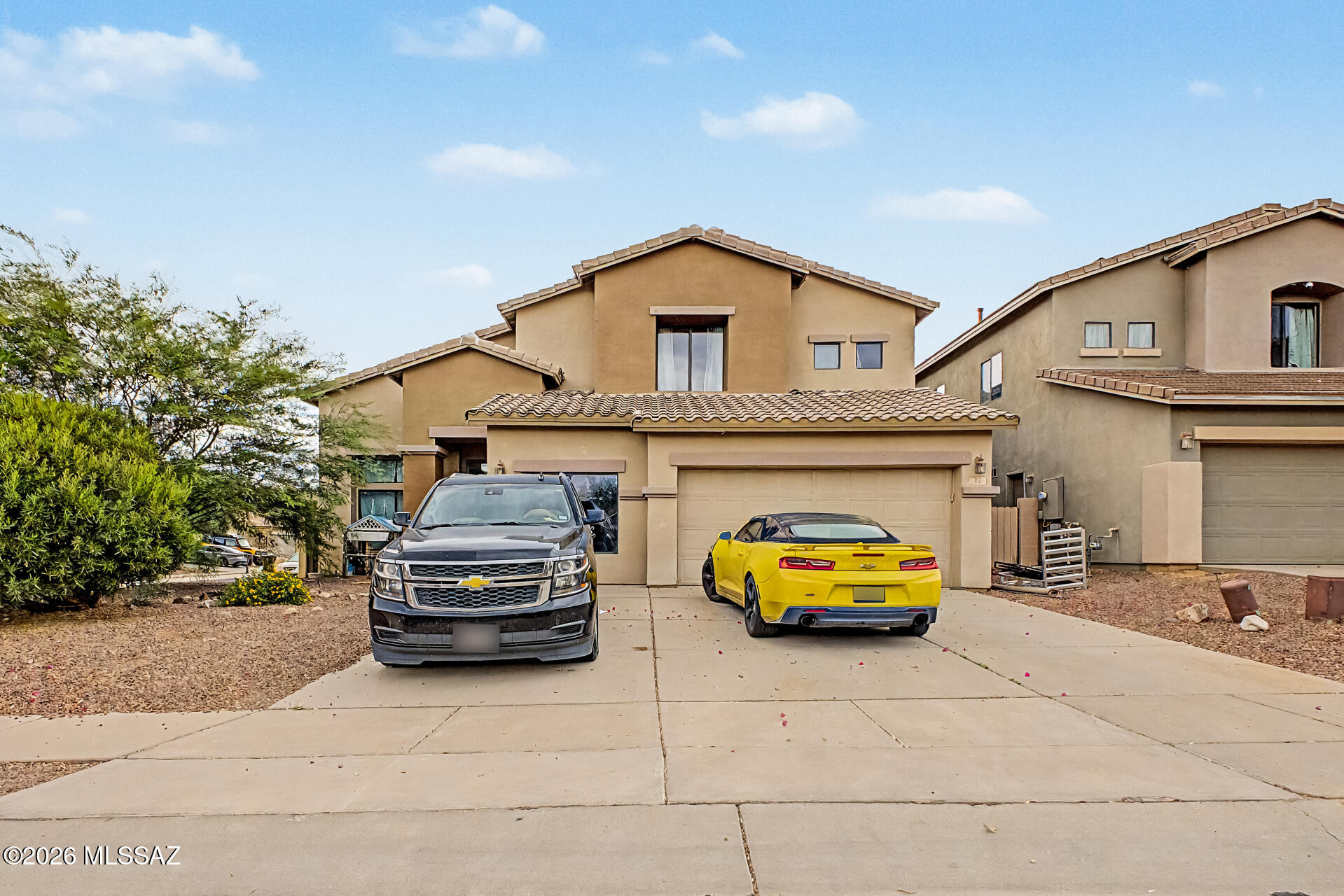 Beautiful large home that inspires the mind w/ towering 25 ft Cathedral ceilings! Great combo of tons of space w/energy efficiency & low electricity bills. Your family will love to entertain in this wonder home which features: Quartz countertops in kitchen & bathrooms, 2 lower level bedrooms + 2 baths, 3 upper level bedrooms w/1 bath, Stainless steel appliances, large loft area for kids (movie night), open floor plan & split bedroom plan, large covered patio, leased Tesla solar ($136/m), & low electricity bills ~ $50/m for 7 months & ~ $200/m most other months w/ 2 brand new 2 seer ''high efficiency'' AC Units (new in 2024). Your family will make memories in this wonderful home which also is located in an ideal location: you can walk to Anza Trail middle school & Splash pad!