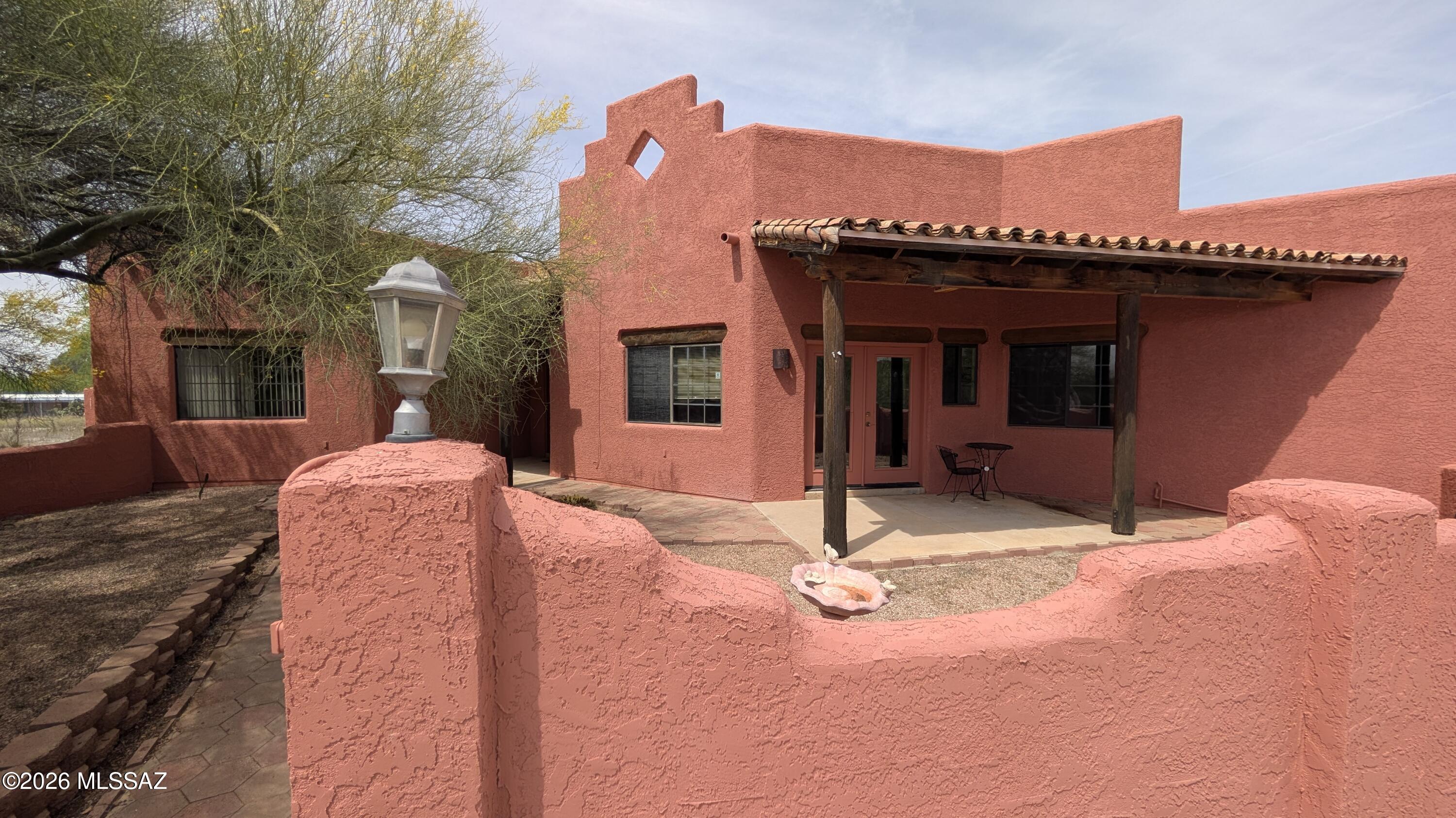 ROOM TO ROAM! Very Special Custom Santa Fe Style home on 3 acres- tucked back away with LOTS of Privacy. 4 Bedroom/2 Bath home with Living, Dining, Family Rooms, and MORE! Three Patios with Views!
Big Swimming Pool, AND... also available is a Separate HUGE STEEL BUILDING: Workshop? Storage? Auto Shop? Parking for your ''Big Boy (or Girl!) Toys''- about 3000SF with Loft for an additional Rental fee of $1500/mo. Take both for a discounted combined rate- Call Listing Broker TODAY for your Personal Tour and Rental details. LONG TERM AVAILABLE. We also do FLEXIBLE LEASES! If you're seeking a Special Place to call Home- with LOADS of Space and Privacy- don't miss this one!