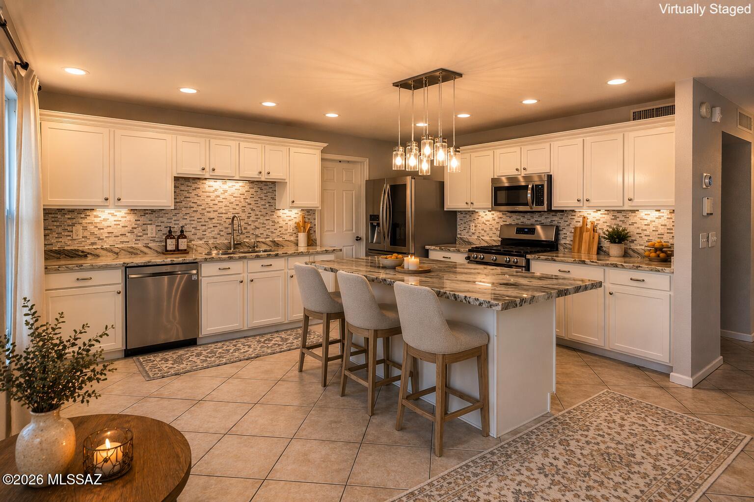 Move-in ready and beautifully maintained, this two-story home combines comfort, style, and efficiency. Inside, you'll find tile flooring, ceiling fans, fresh neutral paint, and abundant natural light that create a bright, welcoming atmosphere throughout. The spacious living room and open-concept great room provide the perfect setting for both everyday living and entertaining. The gourmet kitchen is a standout feature, complete with recessed and pendant lighting, a mosaic tile backsplash, stainless steel appliances, granite countertops, abundant white cabinetry, a walk-in pantry, and a center island with a breakfast bar. Upstairs, a versatile loft offers the ideal space for a home office, media room, or play area. The primary suite is a true retreat, featuring double-door entry, plush carpeting, private balcony access, and an ensuite bathroom with a soaking tub, separate shower, and a generous walk-in closet. Unwind under the covered patio or take a refreshing dip in the pool--your own private backyard retreat. Energy-Savings Included! This home is equipped with a solar system designed to help keep energy costs low. Buyers will assume the existing solar lease, offering predictable monthly payments while helping offset rising utility expenses. Don't miss the opportunity to make this exceptional home yours!