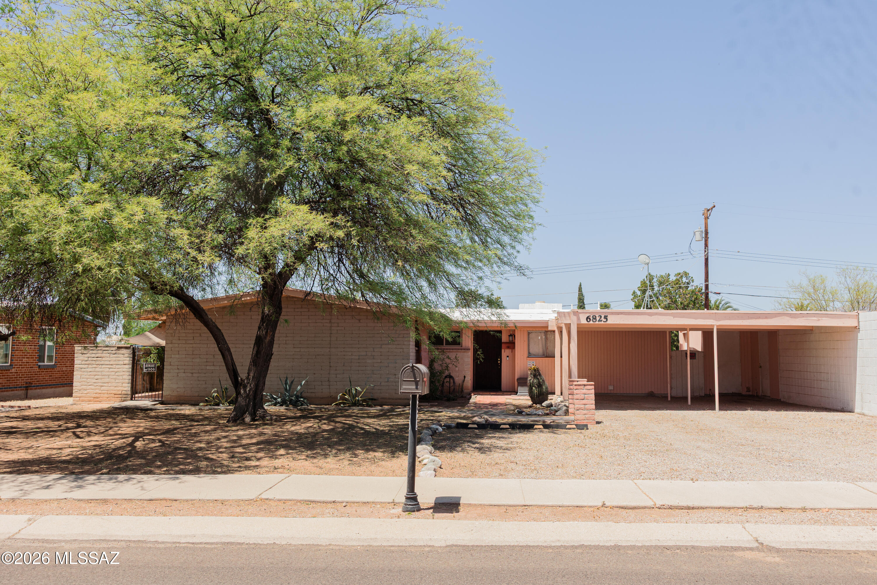 Perfectly located 3 bed 2 bath home with a pool!! This home has a huge flex room that can be a den, office or even a mother in law suite since it has its own private door and patio from the side of the house. Not only is there a large backyard with a pool but there is also a wood burning fireplace in the living area. Come take a look at this versatile  home that has many bonus rooms, storage areas and prime location for shopping!