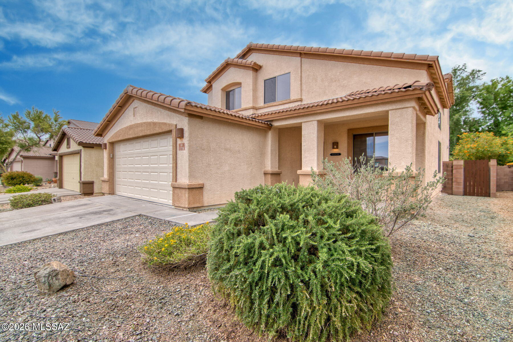 Seller will accept or counter offers between $350,000-$375,000. Beautiful move in ready home in the highly desirable Rancho Del Lago neighborhood in Vail! This home features 3 bedrooms 2.5 baths plus office and great room plan with wood blinds and 18'' tile throughout & new carpet in the bedrooms. Office has pergo flooring installed and can easily be converted into a 4th bedroom. The kitchen includes a widened island and gas stove with stainless steel appliances, and a large pantry. Step outside to the private back yard and enjoy a glass of wine on the extended covered patio. Truck owners will love the extended garage, with a total length of 23' 8''. This home won't last long so call for your personal showing today!