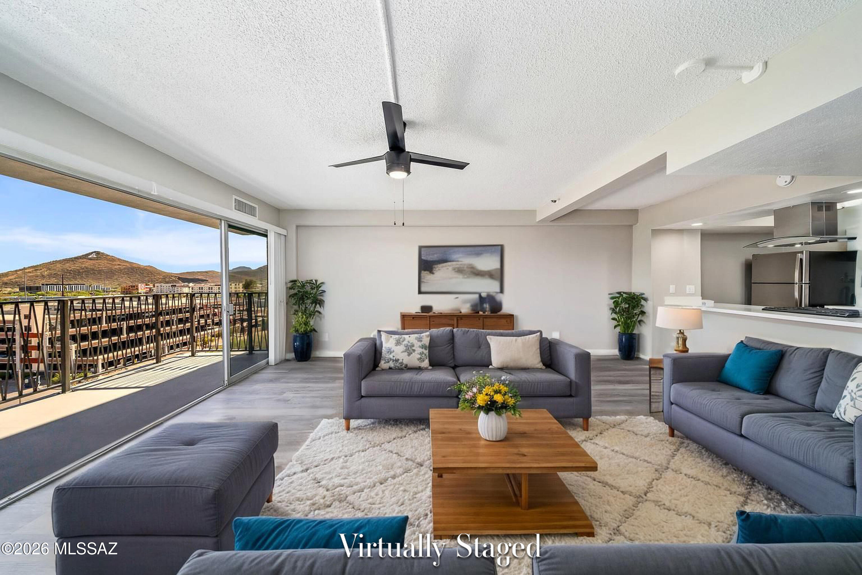 Experience luxury living at Redondo Tower, Downtown Tucson's only high-rise condominium community! Incredible picture postcard views! This beautifully renovated spacious studio condo is perfect for people who want to own where they work and play. Enjoy a state-of-the-art fitness center, pool, meeting rooms, secure off-street parking, covered parking, dog yard, and controlled access. Walking distance to all the flavors of Tucson's foodie scene, art museums, and local entertainment, or hop on the SUN LINK for easy commutes. Minutes from the University of Arizona, I-10, and major employers--live, work, and play in the heart of Tucson! Additional upgrade options available.  Property qualifies for Warrantable Financing!