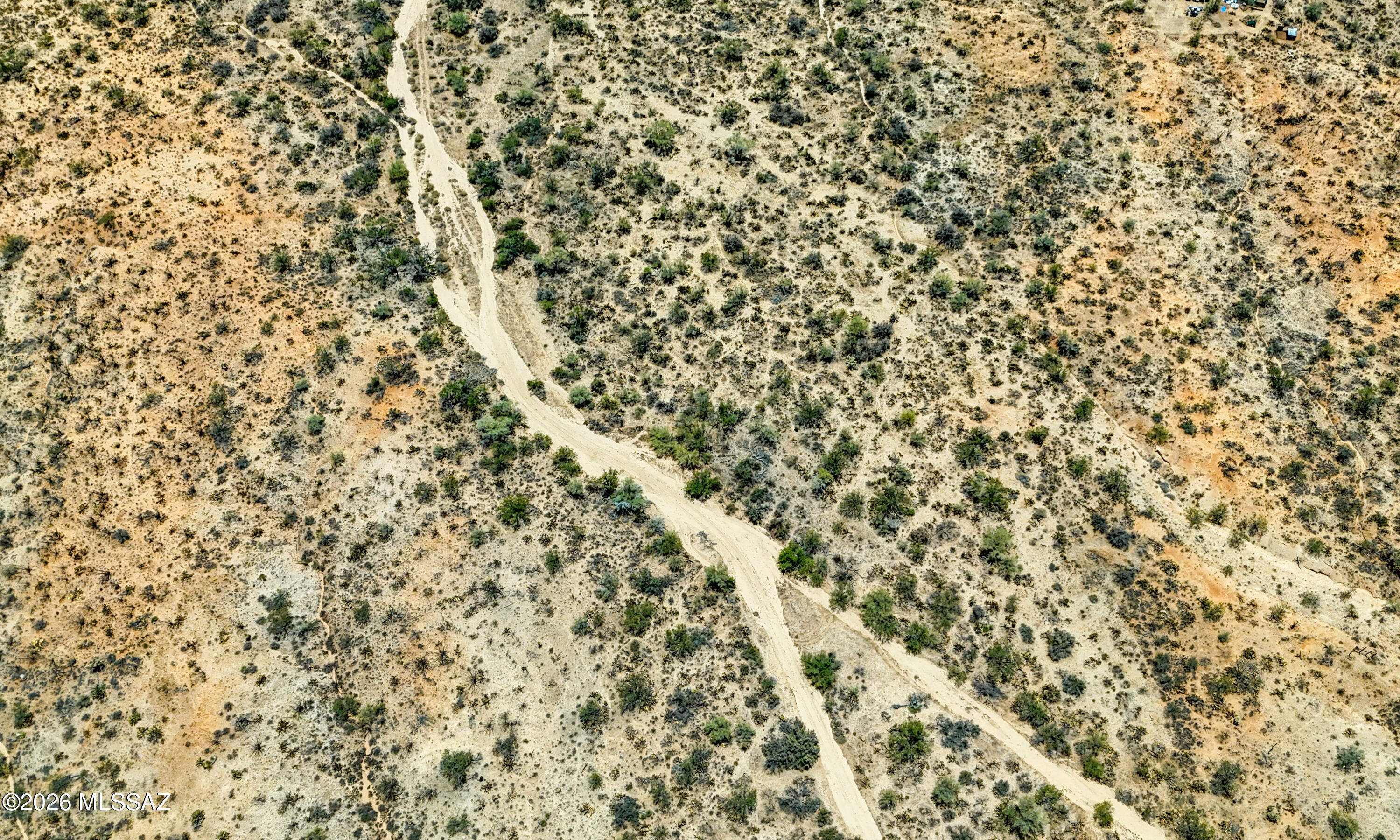 Enjoy the beauty and tranquility of the Sonoran Desert with this 1.0023-acre parcel featuring CR-1 zoning and stunning mountain views. Located in the Diamond Bell Ranch subdivision, this property offers an excellent opportunity to build your custom home in a peaceful rural setting with over an acre of space to create your ideal desert retreat. Enjoy wide-open skies, natural surroundings, and the privacy of country living while remaining within convenient reach of Tucson's shopping, dining, and everyday amenities. Buyer to verify all zoning, utility availability, and building requirements with Pima County.