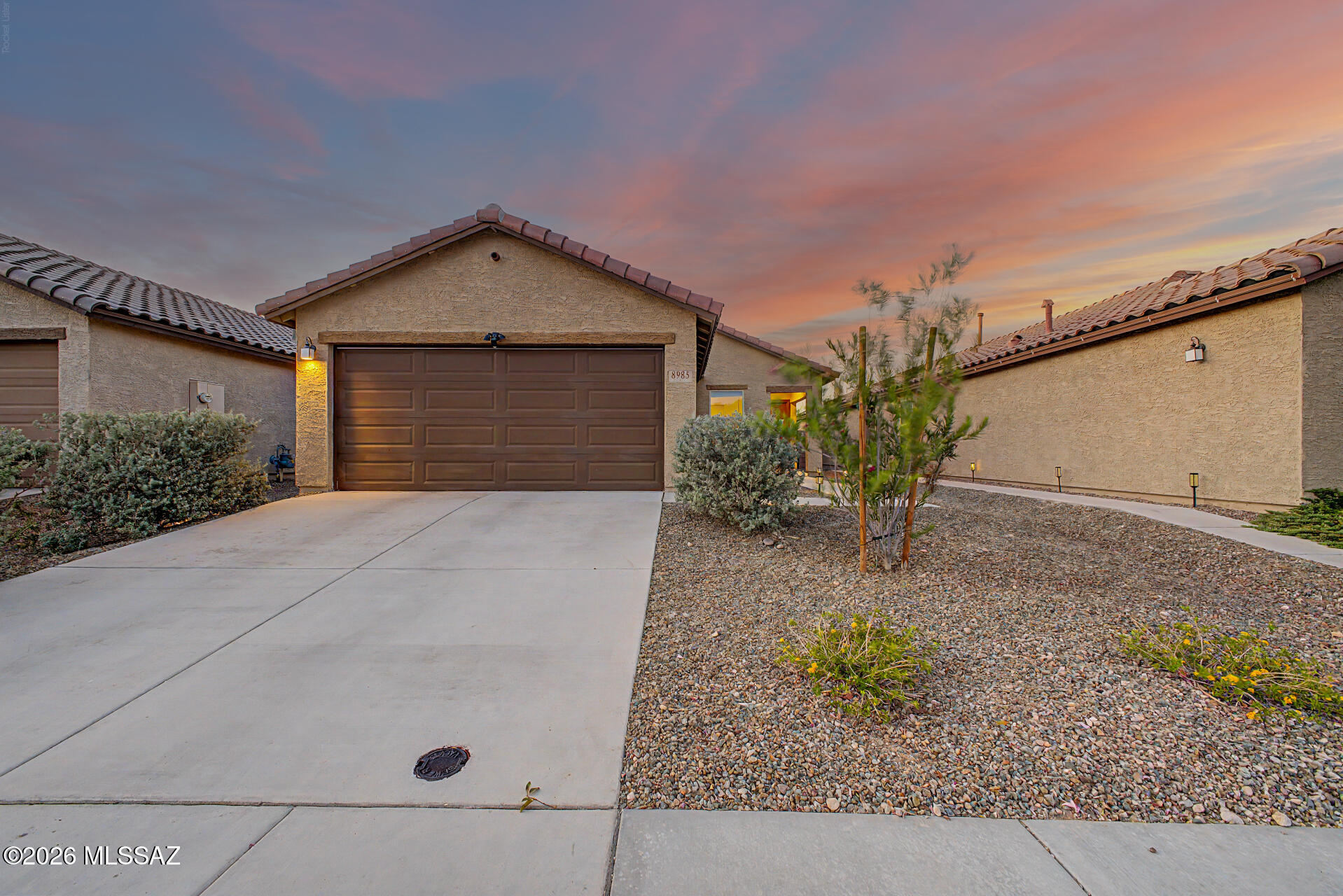 VA Assumable loan for qualified veterans! Beautiful 3-bedroom, 2-bath home located on Tucson's East side in a newer build community featuring parks, dog parks, and walking paths. This turn-key, home offers an open-concept floor plan with spacious living areas designed for both everyday comfort and entertaining. The kitchen flows seamlessly into the main living and dining spaces, creating a bright and inviting atmosphere throughout the home.
Conveniently located just minutes from Davis-Monthan Air Force Base, Saguaro National Park East, grocery stores, restaurants, shopping, and other everyday amenities,this home offers easy access to both outdoor recreation and city conveniences. Enjoy low-maintenance living in a growing East side community with nearby parks and scenic desert surroundings