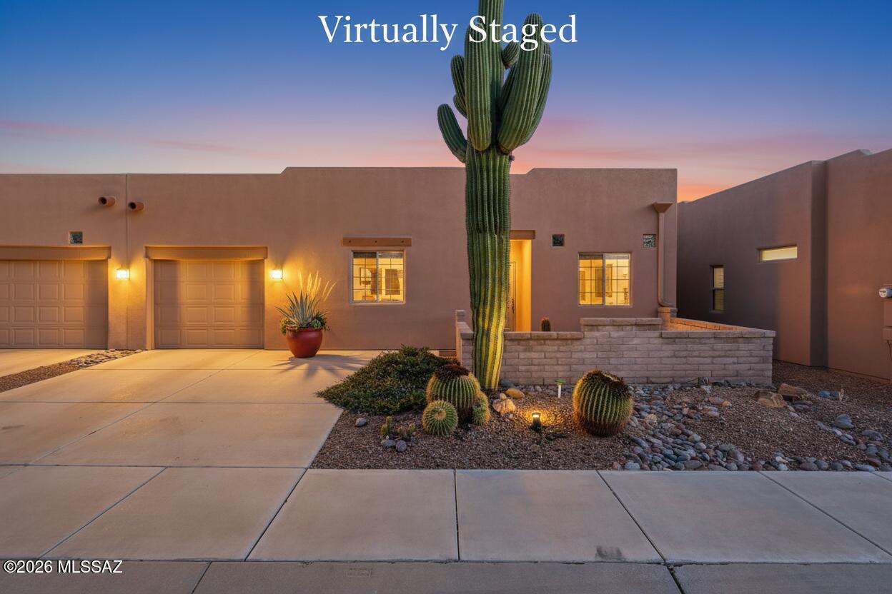 Picture yourself waking up in your cozy retreat in The Springs of Green Valley, where the first rays of morning sunlight spill through your windows, illuminating a home alive with warmth and character. Step outside with your coffee and let your gaze sweep across the majestic mountain vistas that frame your view—a daily reminder of the natural beauty that surrounds you. This vibrant residence may be thoughtfully sized, but it's perfectly crafted for the carefree lifestyle that you are dreaming of.  The welcoming great room serves as the heart of the home, where natural light pours in through generous windows, creating an inviting atmosphere for both everyday moments and special gatherings. Inside, every corner radiates charm and personality with spaces that feel both intimate and inviting The  front courtyard offers another delightful dimension to your outdoor living experience. But the true showstopper awaits out backthe spacious patio is where memories will be made. Whether you're hosting sunset dinners with friends, cultivating a desert garden, or simply stargazing under Arizona's brilliant night sky, this generous outdoor space becomes an extension of your living area and the backdrop for countless cherished moments. You're not just buying a home, you're embracing a lifestyle.  This is desert living at its finest, where quality trumps quantity and every day feels like a retreat!