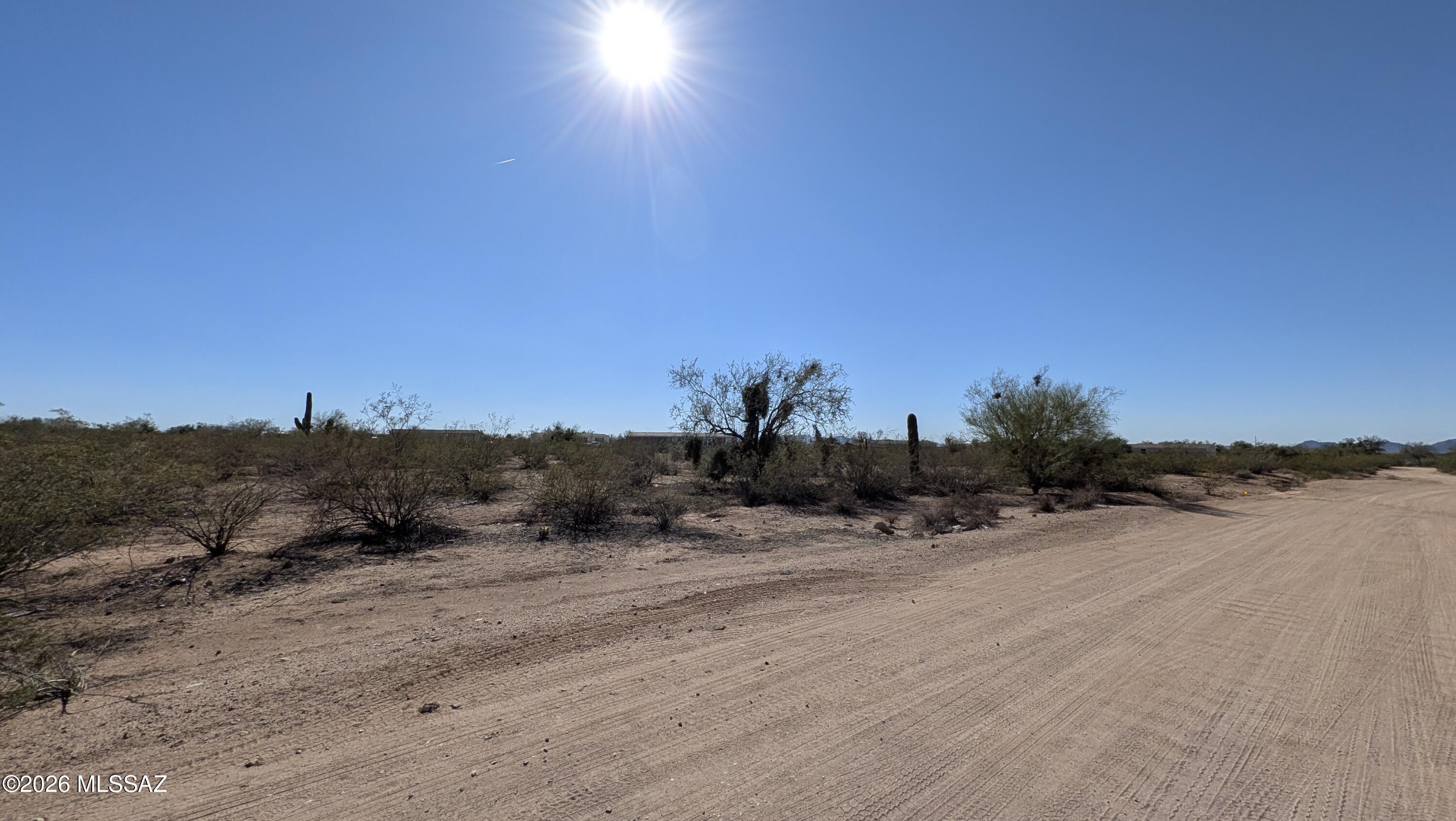 Great opportunity to own an affordable one-acre desert lot tucked away in a quiet, peaceful setting. This hidden little spot offers natural desert landscaping, open skies, mountain views, and plenty of room to create your own Arizona retreat.

Water and electricity are available at the lot line, with water through a shared well. The property offers flexibility for either a manufactured home or site-built home, making it a great option for someone looking for space, privacy, and room to make it their own.

Enjoy the quiet dirt roads, wide-open feel, and natural desert surroundings while still having nearby homes in the area. A great place for anyone looking for affordable land with potential.

Seller financing available. Seller will carry.
Adjacent lot also for sale