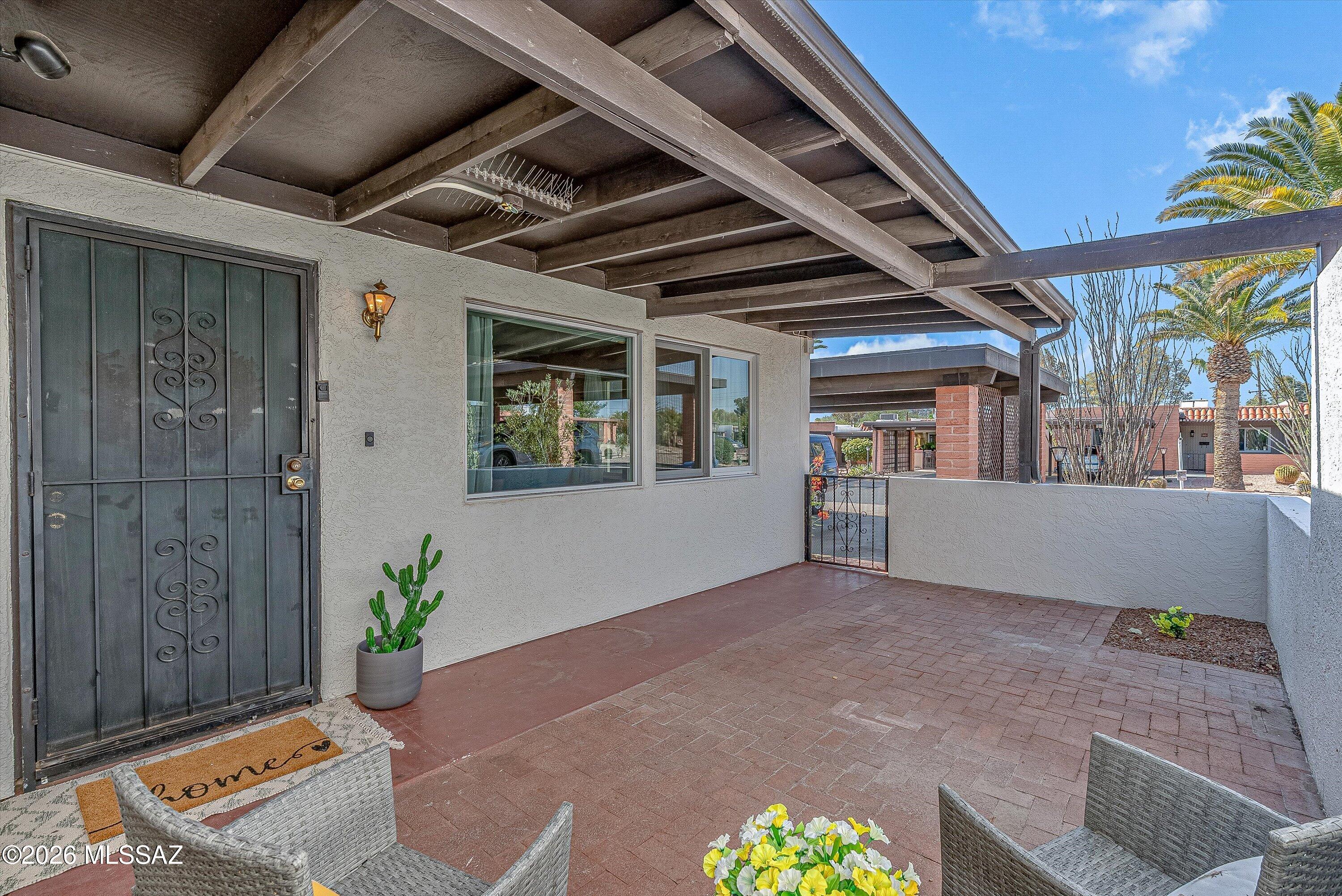 Welcome to easy, low-maintenance living in the heart of Green Valley! This charming brick townhome offers the perfect combination of comfort, convenience, and value, all within one of the nation's premier active adult communities. Ideally located near one of Green Valley's 14 recreation centers, you'll enjoy easy access to swimming, pickleball, fitness classes, arts and crafts, social clubs, and countless activities that make every day feel like a vacation.
Thoughtfully designed for effortless living, this move-in ready home features an updated kitchen with modern appliances, beautiful tile flooring throughout, and a functional floor plan that makes the most of every square foot. The inviting front patio creates the perfect place to enjoy your morning coffee or visit with friendly neighbors, while the private backyard offers space for pets, gardening, or simply relaxing outdoors.
A separate laundry room conveniently houses the stackable washer and dryer while providing additional storage and direct access to the backyard. You'll also appreciate the detached storage shed, abundant interior storage, and the energy-efficient tankless water heater.
Whether you're searching for a full-time residence, seasonal retreat, or lock-and-leave home, this delightful townhome offers exceptional value, low-maintenance living, and everything you need to enjoy the Green Valley lifestyle. Affordable, inviting, and move-in ready, this is one you won't want to miss!