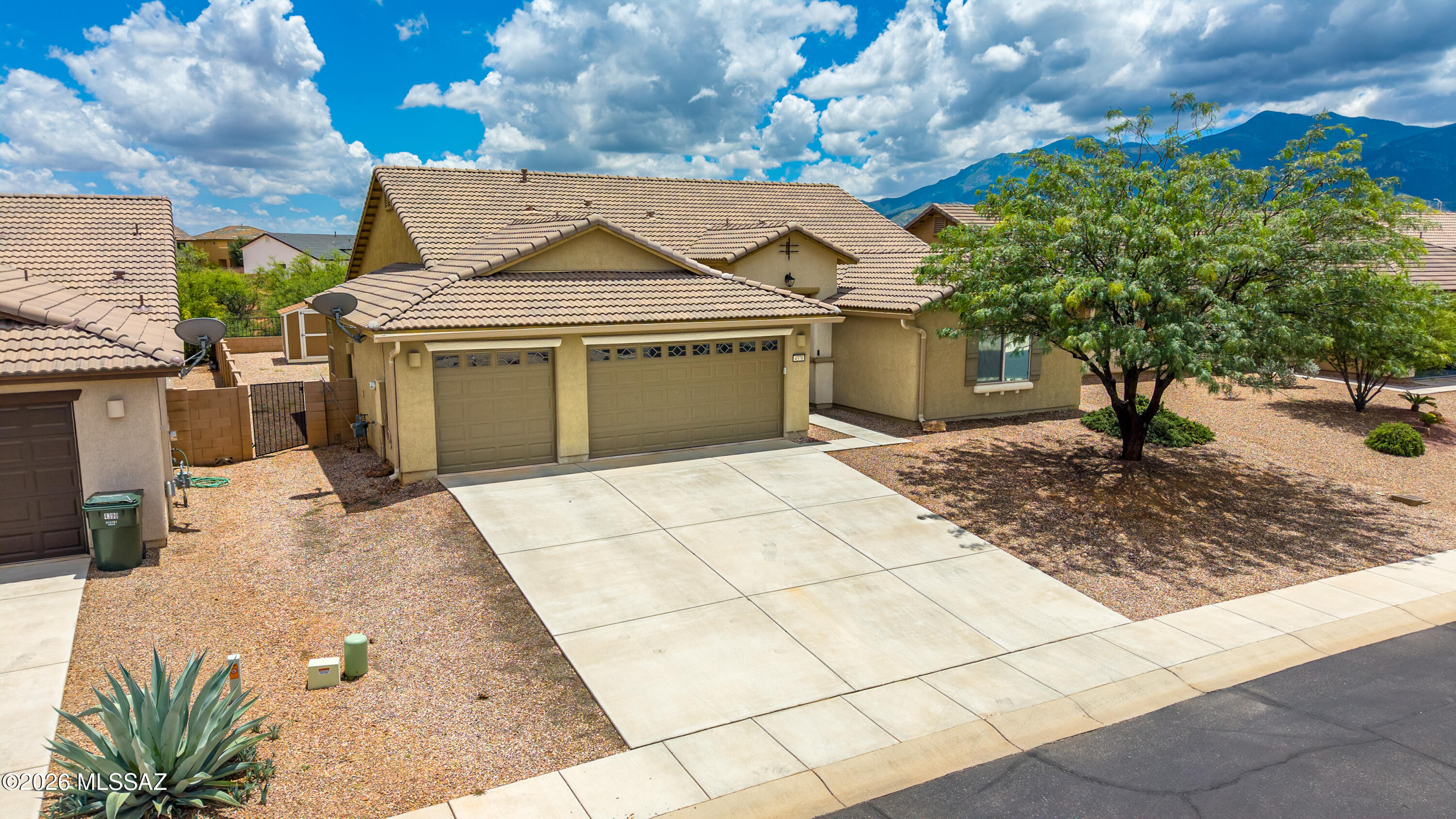 Live Where You Play in the sought-after Holiday subdivision, where you'll enjoy resort-style amenities including community pools, parks, and recreational spaces. This beautifully upgraded 5-bedroom, 3-bath home offers 2,795 square feet of thoughtfully designed living space with a desirable 3-car garage. The open-concept floor plan features soaring 11-foot ceilings in the great room, a spacious kitchen with a charming bay window at the breakfast nook, upgraded cabinetry with crown molding, glass display doors, satin marble granite countertops, stainless steel appliances, a gas double oven range, refrigerator, under- and over-cabinet lighting, and abundant storage. The private guest suite with its own full bath is perfect for visitors or multigenerational living. Additional Features Include- Throughout the home you'll find faux wood blinds, elegant hawk-and-trowel interior wall texture, upgraded cabinet hardware, drawer banks in the bathroom vanities, three-speed ceiling fans in the great room and primary suite, plus fan prewiring in every bedroom and on the covered patio.

Additional upgrades include a water softener, 50-gallon water heater, utility sink in the garage, pedestrian garage access door, and a gas stub for your future BBQ.

Step outside to a low-maintenance backyard featuring concrete and paver hardscaping, a storage shed on a concrete slab, and a block wall with view fencing--perfect for relaxing or entertaining while enjoying the surrounding views.

This exceptional home combines quality upgrades, functional design, and outstanding community amenities, making it a must-see.