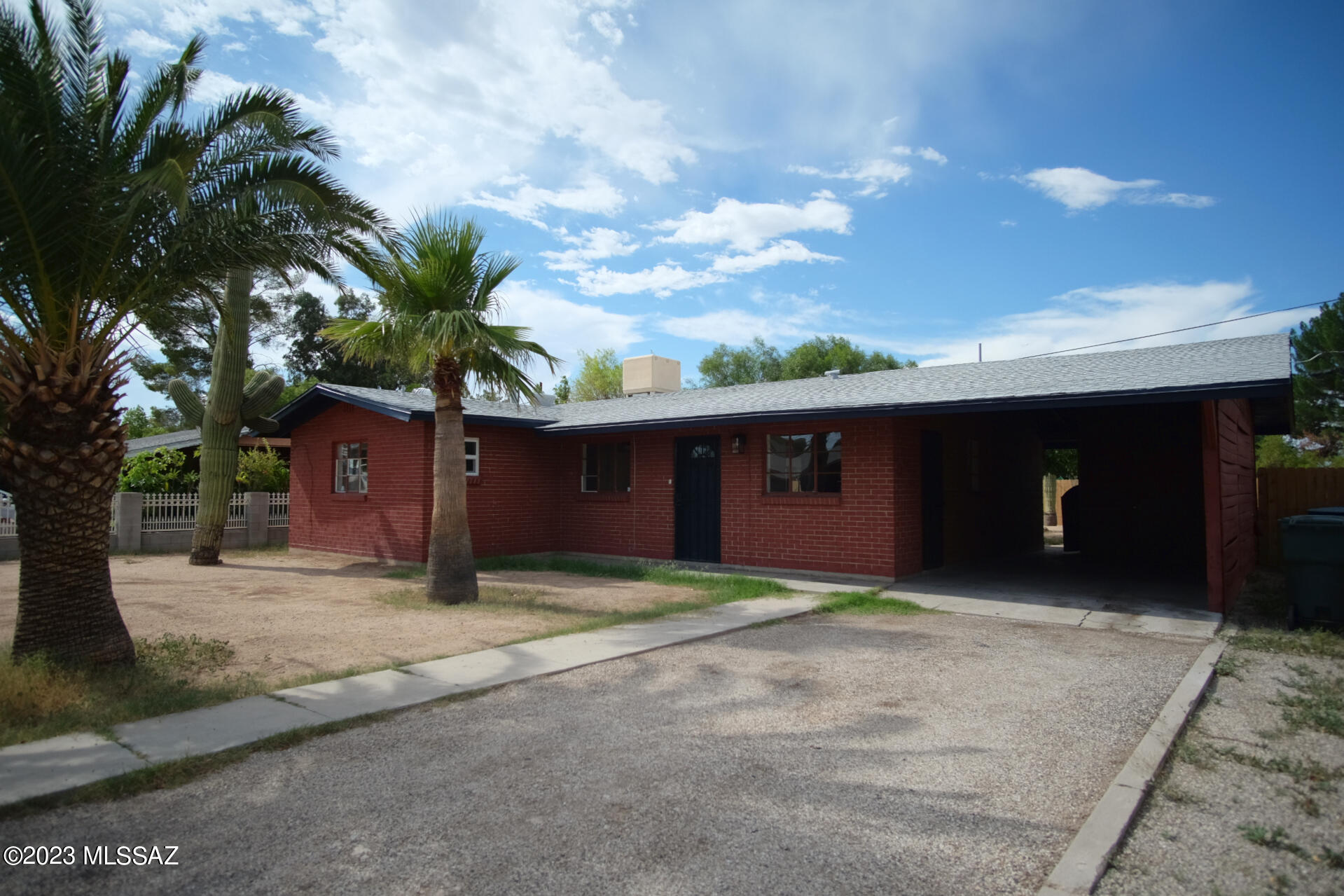 Text for more info/walkthrough video. Central Tucson Renovated 3 Bedroom/2 Bathroom + AZ Room 1278sf single-story Brick Home features an open floorplan with Modern Finishes + Fixtures throughout; Master BR Suite w/ private Bathroom; Central Air Conditioning; Laundry Room w/ washer + dryer incl; Car Port; Arizona Room; private walled-in Backyard w/ mature Desert vegetation; located on a Cul-De-Sac. Tenant pays all utilities. 1yr minimum Lease, Costs are; non-refundable $50/adult Application, $1725 Security Deposit, $150/pet Pet with approved pet, $400 cleaning. Available immediately.