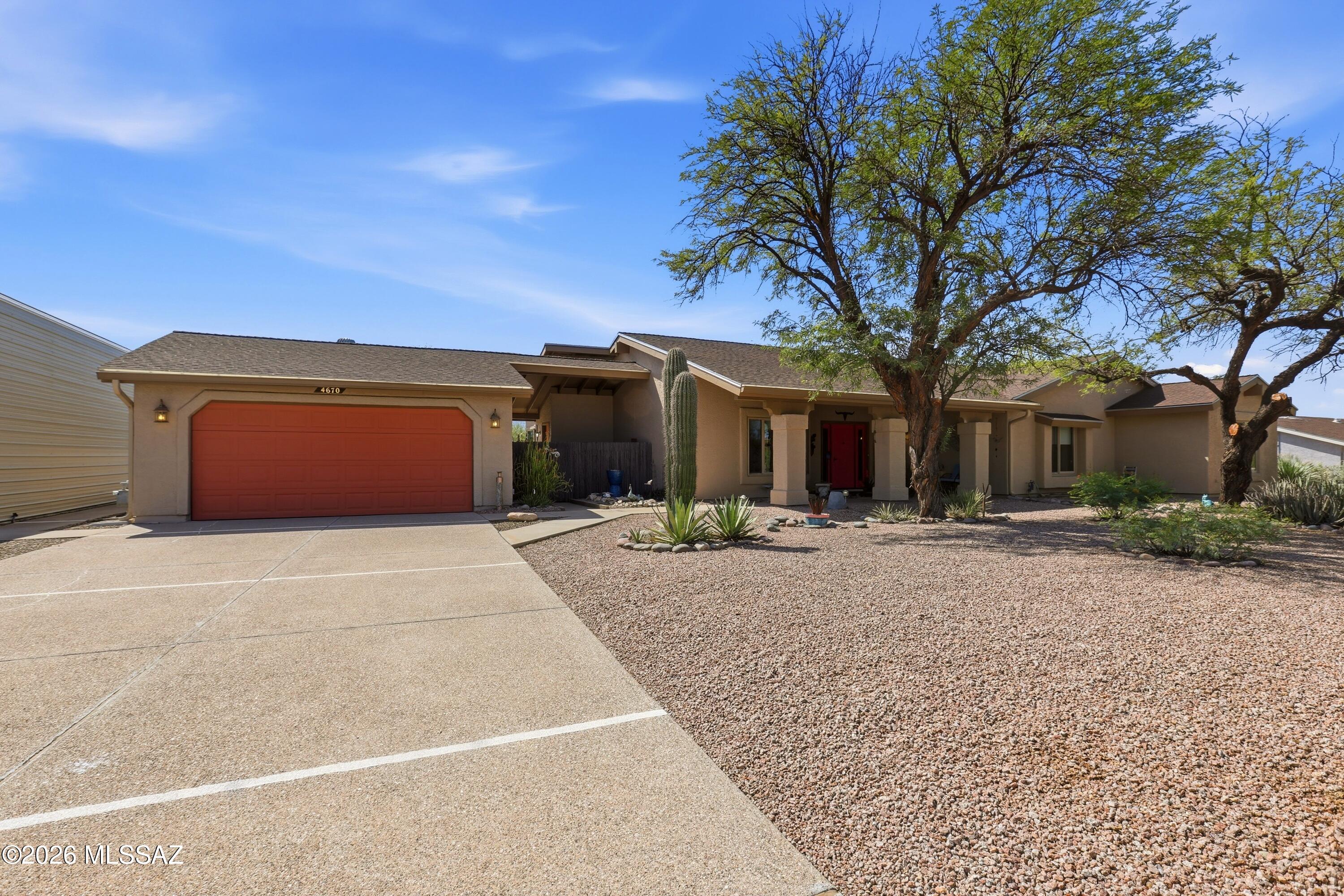 Super well maintained 4 bedroom home in a private desert setting with excellent views. Great curb appeal with inviting covered entry. Excellent floor plan with lots of living space, including family room or dining room off the kitchen, a separate living room, and den too. Great mountain views and backs up the Pima County greenbelt. Super energy efficient with Marvin Infinity Windows, and Navien tankless combo heater/endless hot water heater. Steele 14'H X 40'L X 14'W enclosed RV carport, xeriscaped front and back yards for easy care and beauty. Don't miss out on this comfortable ready to move right into home. Owned solar panel system for great savings, one year buyer home warranty also included.