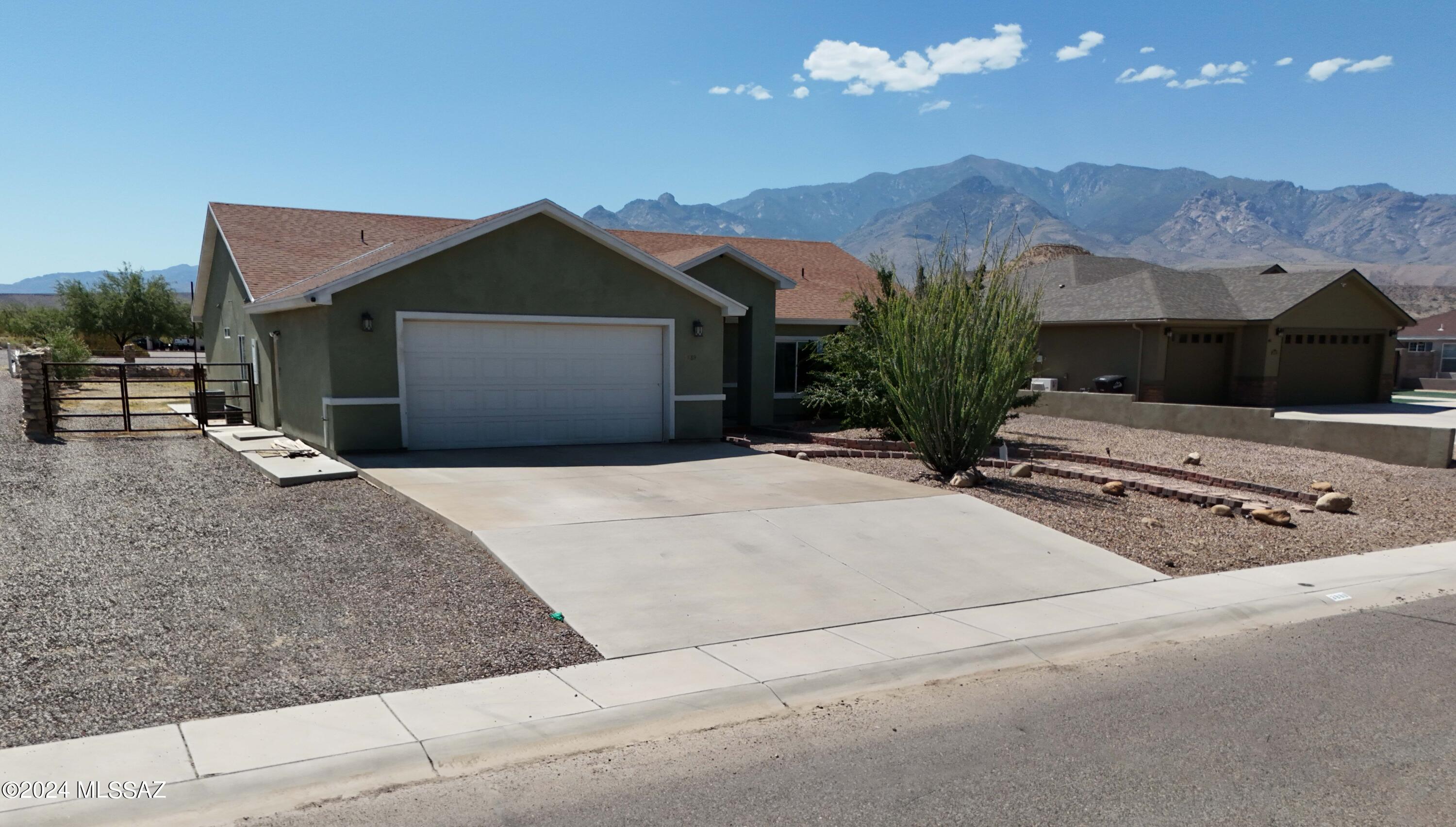 Situated on a quiet street, this 3 bedroom plus office/den home features spacious living areas, high ceilings, large backyard with extended covered patio, garage includes a 3ft wide x 10ft lockable temperature controlled safe with shelves and racks. Don't miss out on the breathtaking Mountain View's and the avid golfer will love being minutes from the Thatcher Golf course.  Enjoy all of this including owned solar panels that are ready for their next owners. Come take a tour!