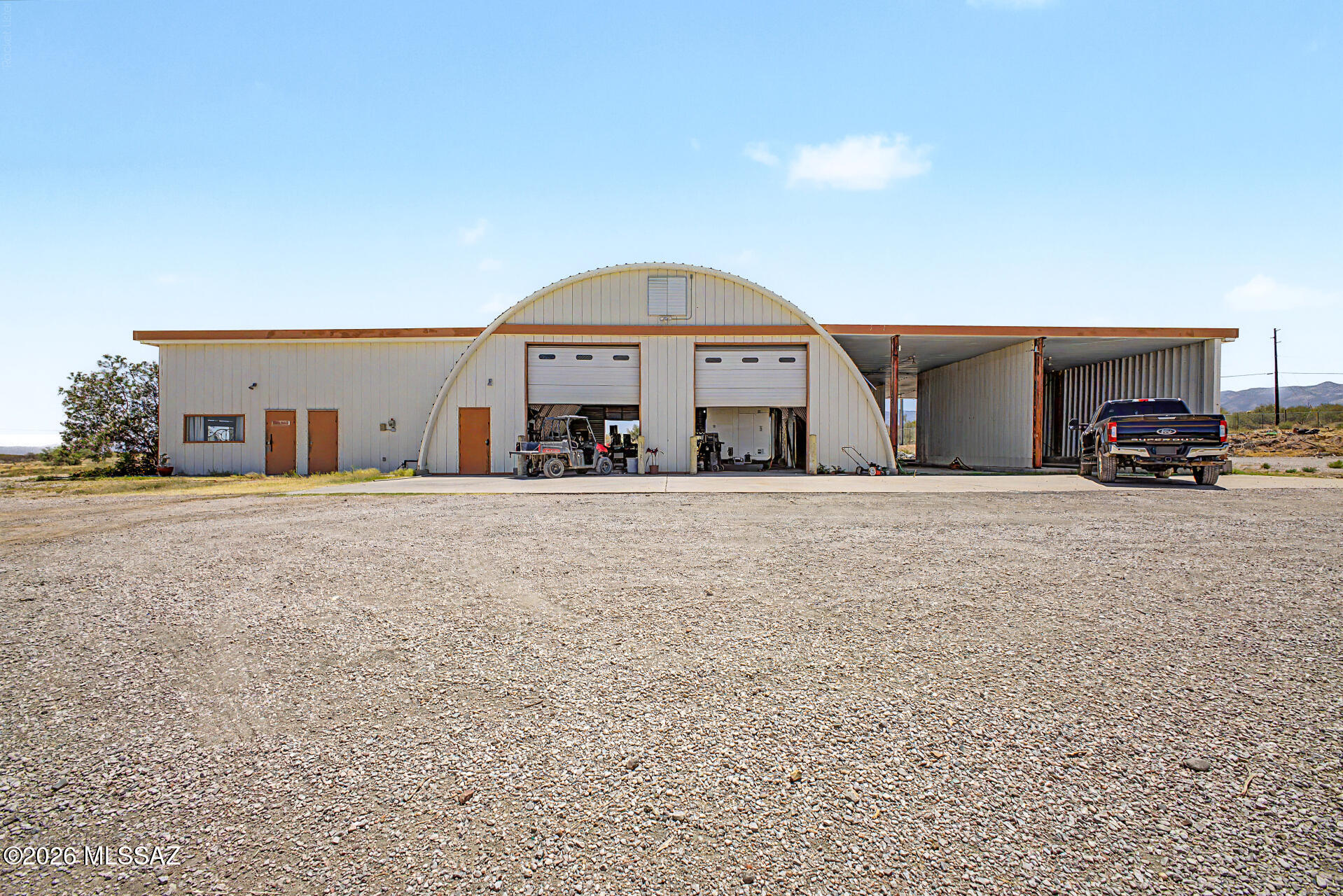 Multi-use commercial property CB2 ZONE,  14'-18' clear height, 12' & 14' roll up doors (4), 3393 sf service garage area, 2007 sf office space, plus 2400 sf service bay, 1200 amps 240/120 3 phase power. Newer HVAC unit for the office/apartment space, Evap in the Main shop.  Includes a large 2.42 acre lot. Multiple uses include auto repair, rental, bar, nightclub, light manufacturing or assembling & wholesale.