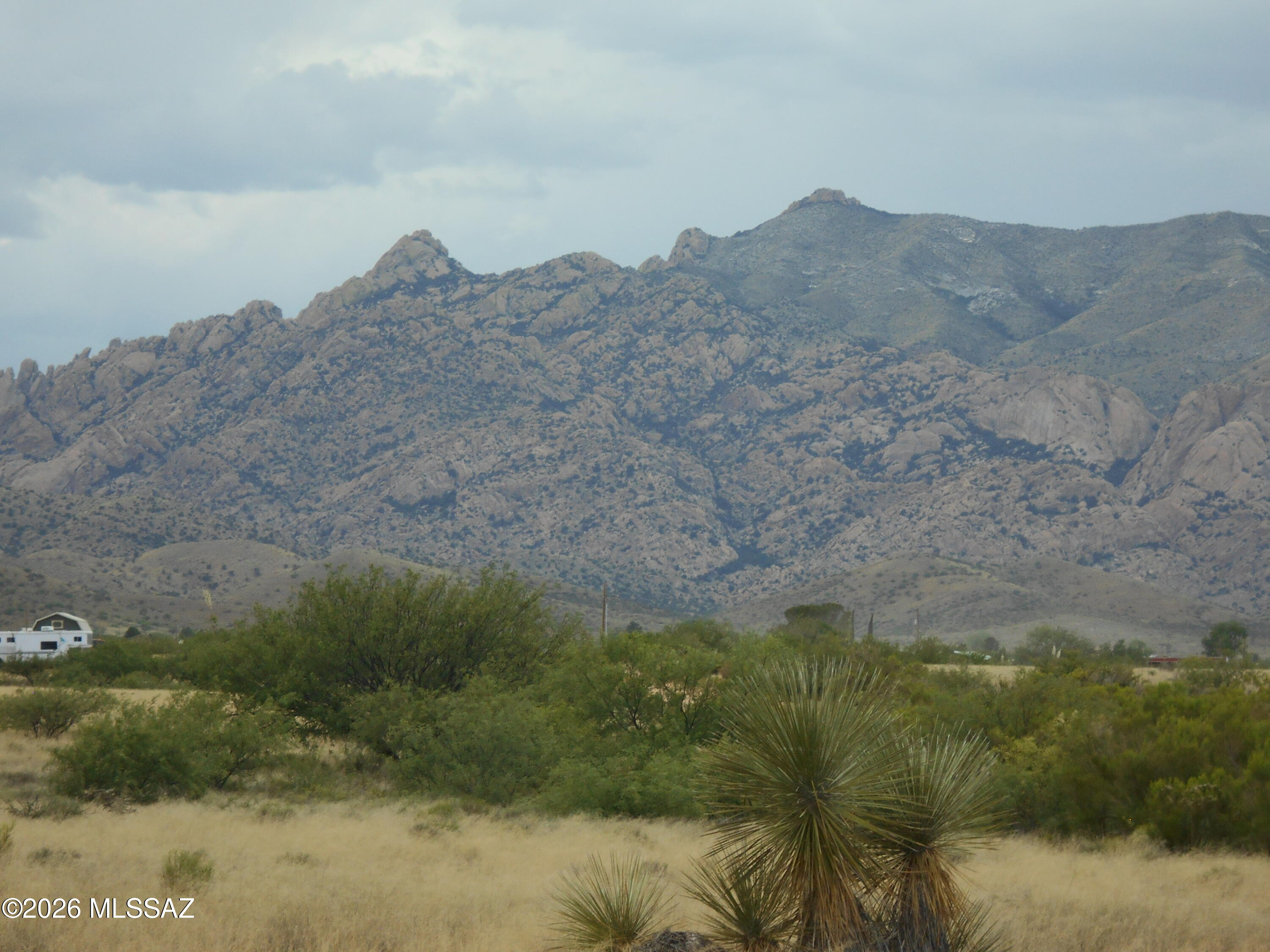 Here's a great opportunity to purchase 2 beautiful lots together on Treasure Road just outside of Sunsites. This would be a wonderful place build a home. You have the convenience of a county maintained road and a spectacular view of Cochise Stronghold! Lots of wildlife, birding opportunities, and dark night skies, for stargazing! These lots are affordably priced, and the location is fantastic! Don't wait too long....this offering won't last long!