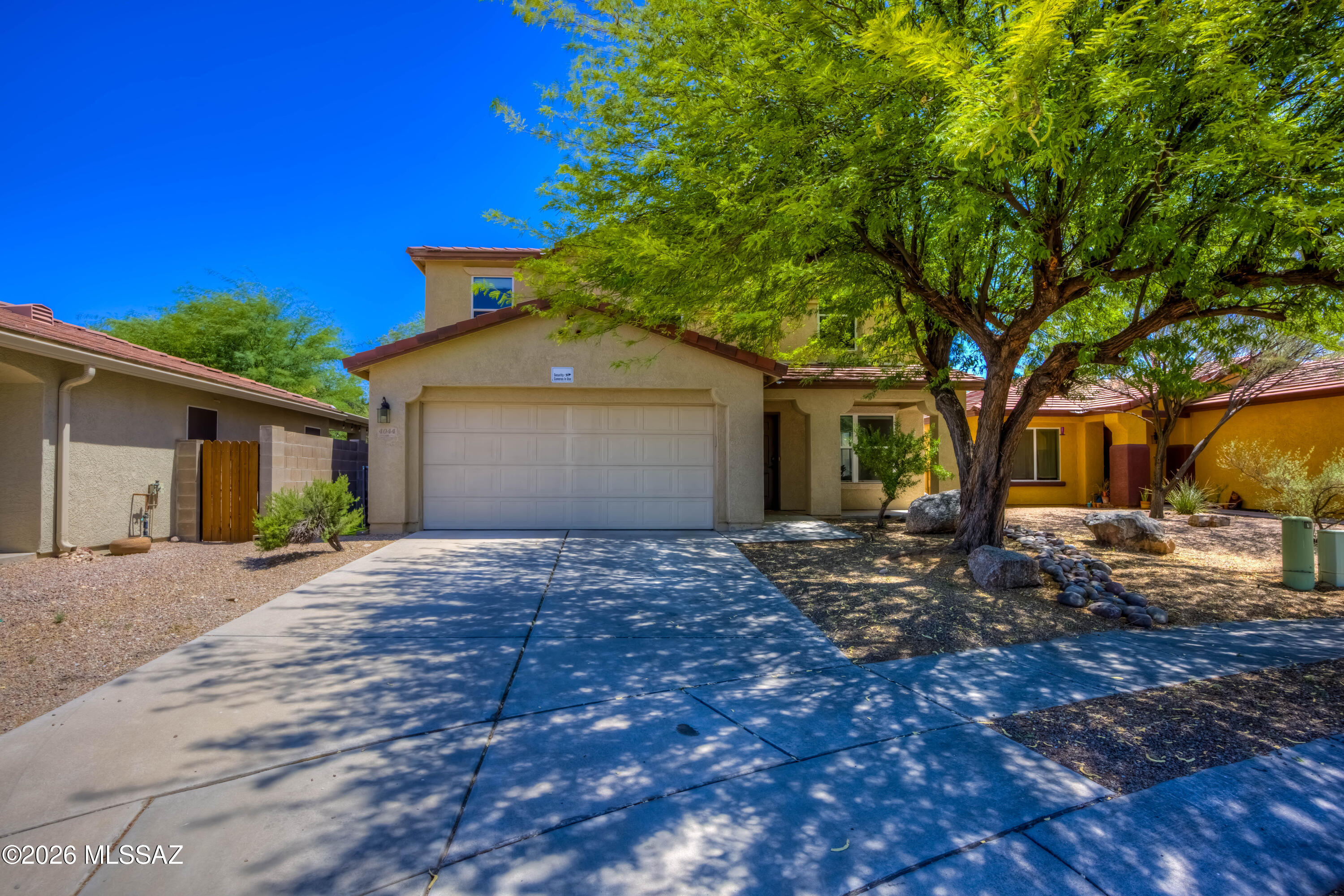 * Seller will accept/counter offers between $475-$500*  Welcome home to this beautifully updated home offering an inviting open-concept floor plan. Natural light and modern finishes throughout this diamond. The spacious living and dining areas flow seamlessly into the stunning remodeled kitchen, making this home ideal for both everyday living and entertaining. The remodeled kitchen features quartz countertops, stylish cabinetry, Stainless steel appliances, French door twin cooling Samsung refrigerator, Subway tile backsplash, a large island with seating, updated lighting, Garage has been converted to extra living space (office,Gym, 5th bedroom), 4 mature fruit trees on irrigation,Full house water system, Low-maintenance private back yard with Flagstone through back patio. exceptional property your own.