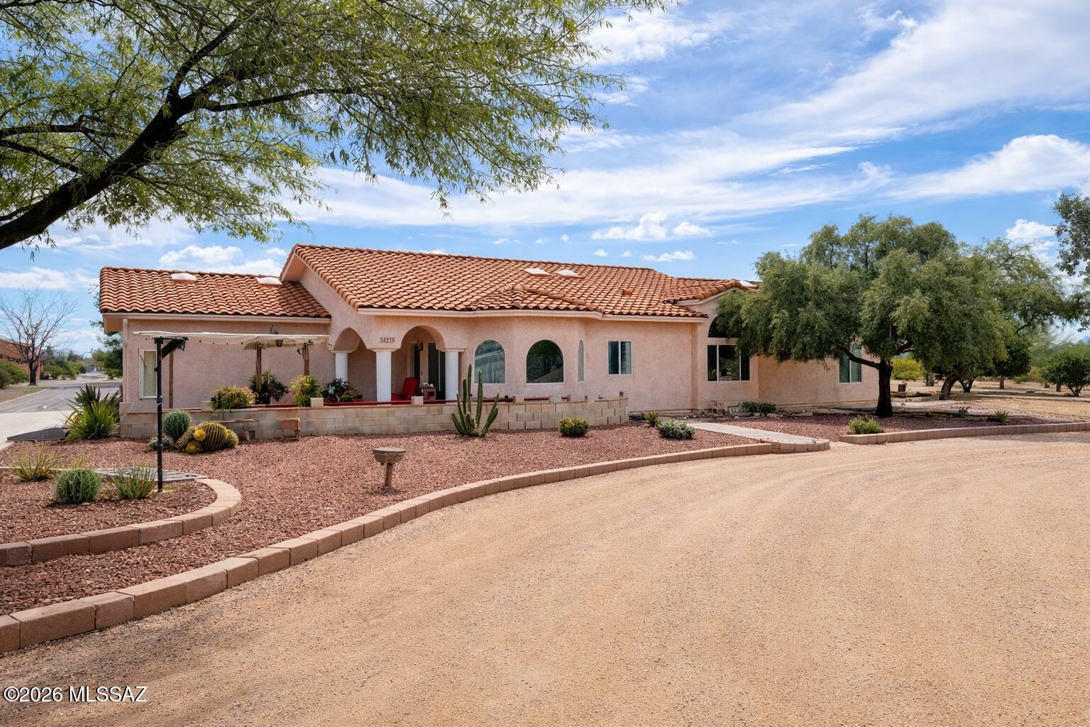 NEW ROOF and NEW WINDOWS.   Experience 4 acres of beautiful high desert in this 3-bedroom home with 2.5 baths, 2 car garage, full RV hook ups, and 3 extra storage buildings. This home is made with metal frame and post-tension flooring.  HVAC, water heater, and appliances are only two years old. High speed internet with Transworld Network. All appliance stay including a chest freezer. Bring the horses and the side by sides, enjoy trail rides for miles.