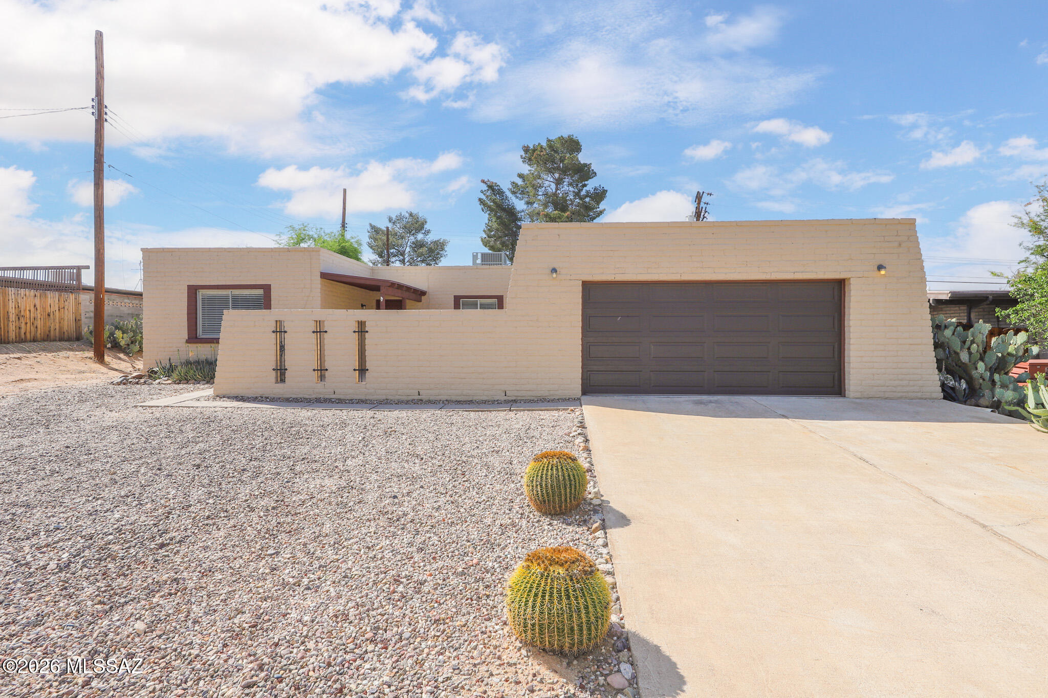 Located in the Northwest side of Tucson, this beautiful home has lots to offer! The floor plan features 1,512 square feet of modern living space with 3 beds,2 baths, and a 2 car garage. When you step inside, there is no carpets, an open floorplan that links the living room & kitchen, a beehive fireplace, and bathrooms have custom vanities.The kitchen is spacious, has granite countertops, a center island, and lots of cabinets for storage. The primary bedroom is large with a walk in closet. The front yard has a cozy courtyard and the backyard has a cover patio and is private. This home is close to everything such as shopping, parks, restaurants, and access to the I-10 freeway. NO HOA. Seller just replace the AC unit and is under 2 years old with warranty. Come see today and make THIS YOUR NEW HOME!

FHA Loan possible assumption for eligible FHA Buyers with rate at 5.375%