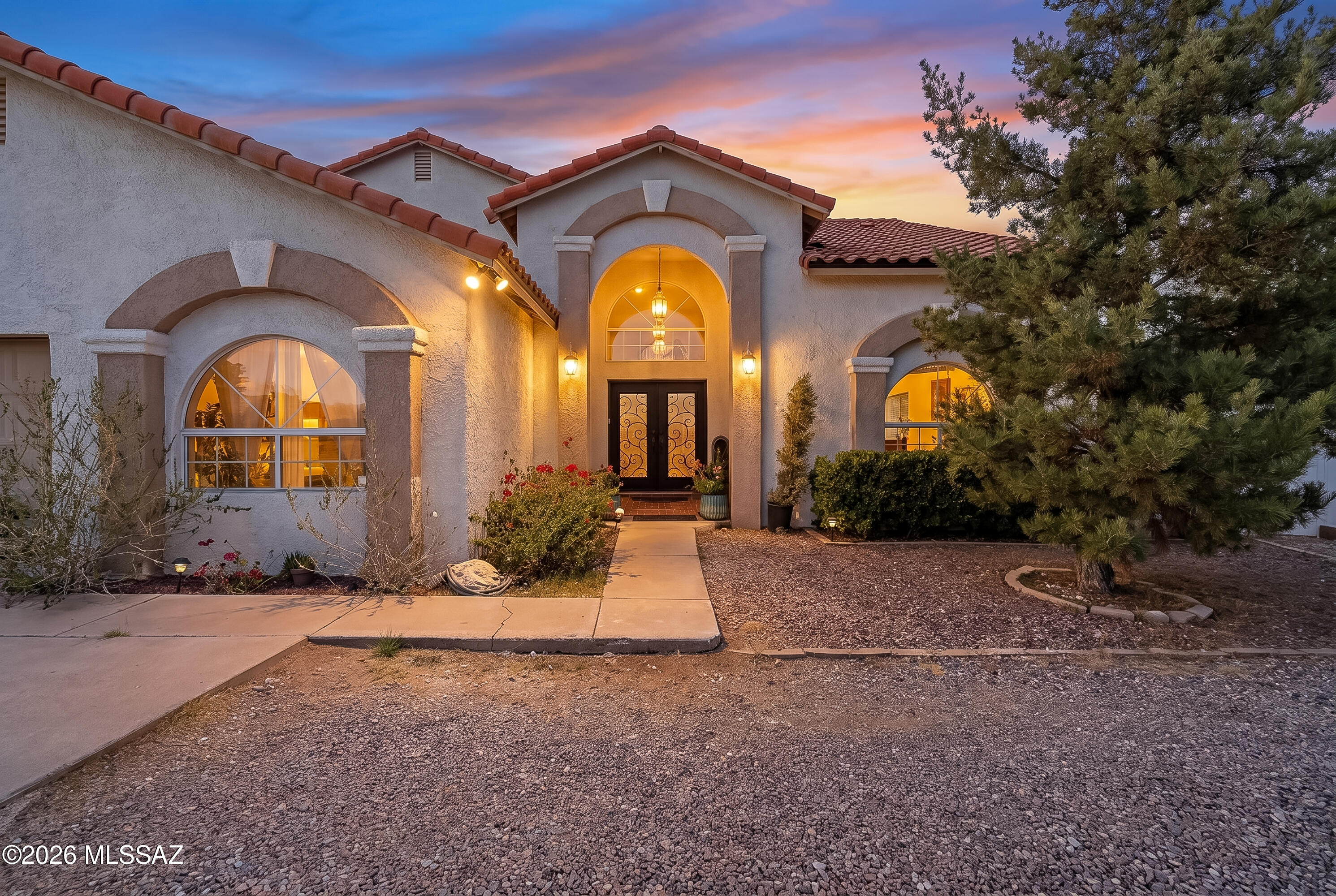 Experience the perfect blend of space, character, & breathtaking scenery in this custom-built home situated on 1.50 acre lot. Offering 3,572 sqft of thoughtfully designed living space, this residence features 5 Bedrooms & 4 Bathrooms, providing room for everyone to live, work, & entertain comfortably, Inside you'll discover new tile flooring, a striking wooden staircase that serves as the centerpiece of the home, and a dramatic mezzanine overlooking the spacious family room below. The wood-burning fireplace creates a welcoming atmosphere, while large windows frame spectacular mountain views from multiple vantage points throughout the home. Outside, enjoy the privacy & security of a fully fenced backyard. Additional updates include a newer room & newer AC Units. This gem is one of a kind.
