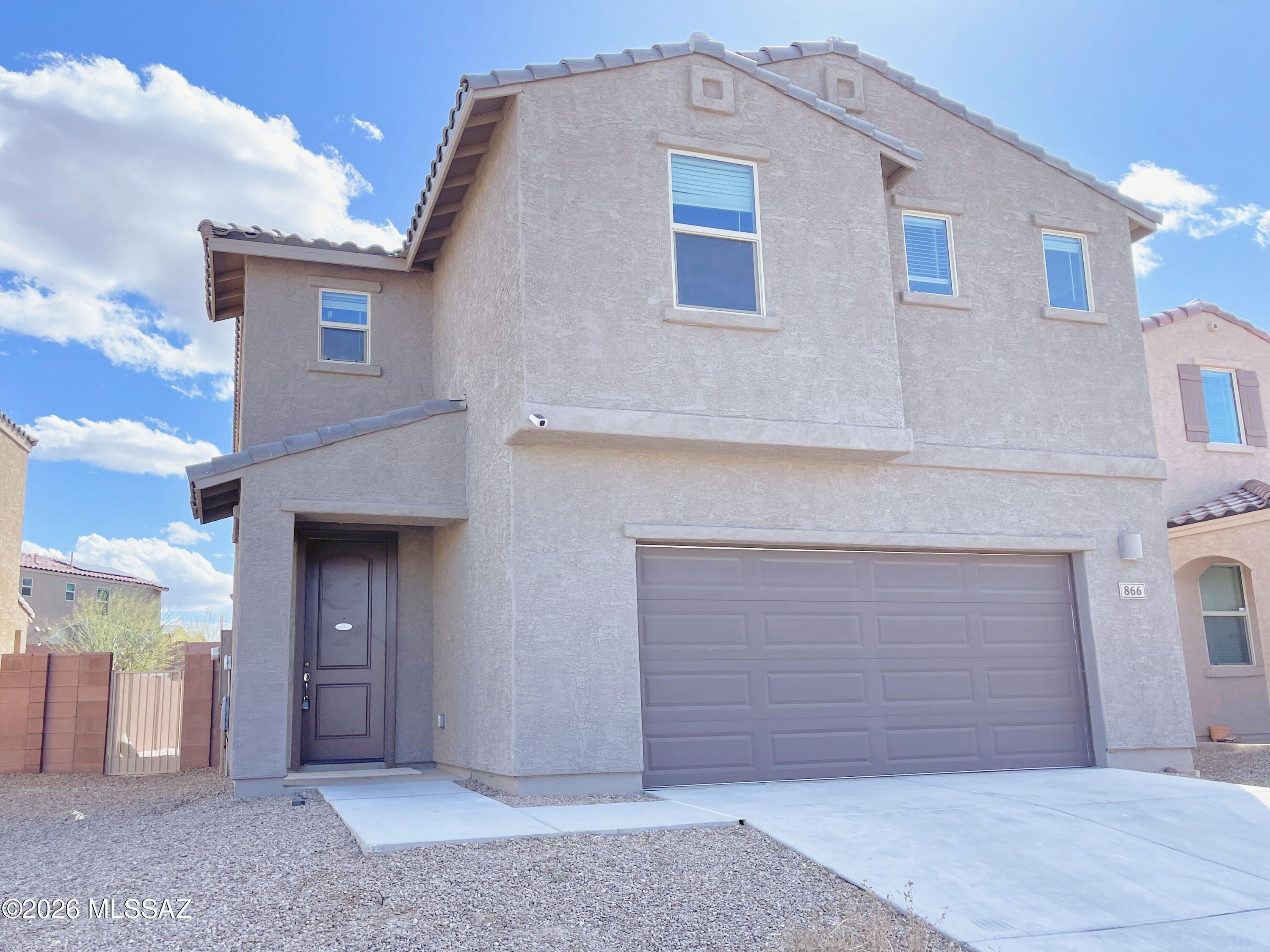 No Application Fees! Spacious 4-bedroom, 2.5-bathroom Sahuarita home offering an exceptional floor plan and numerous modern upgrades. This beautifully maintained home features tile flooring throughout the entire first floor, plush upgraded carpeting upstairs, neutral paint throughout, recessed LED lighting, 2-inch faux wood window blinds, ceiling fans in each room, and abundant natural lighting. The versatile layout includes a spacious downstairs living room with an electric fireplace, formal dining area, and a large upstairs loft that is perfect for a home office, media room, game room, or additional family room. The stunning kitchen features granite countertops and backsplash, extensive cabinet and counter space, separate pantry, oversized island with breakfast bar, gas range, and stainless-steel appliances. All four bedrooms are located on the second floor, including the oversized primary suite featuring a large walk-in closet, dual sink vanity, separate linen closet, and spacious step-in shower. A full-size washing machine and dryer are included for added convenience, and the attached two-car garage provides ample parking and storage. The professionally landscaped backyard is designed for outdoor enjoyment with a covered patio, extended concrete and paver patio areas, large synthetic grass area, and storage shed.

The community offers a sparkling pool, beautifully maintained parks, walking paths, playgrounds, and greenbelt areas, allowing you to enjoy resort-style amenities without the maintenance. Conveniently located near shopping, restaurants, schools, golf courses, and outdoor recreation with easy access to Tucson, Green Valley, and the many amenities throughout Southern Arizona.

All Denali Real Estate residents are automatically enrolled in the Resident Benefits Package (RBP) for $55.00/month which includes Renter's Liability Insurance, Credit Building to help boost the resident's credit scores with timely rent payments, up to $1M Identity Theft Protection, HVAC air filter delivery (for applicable properties), our best-in-class resident rewards program, and much more!