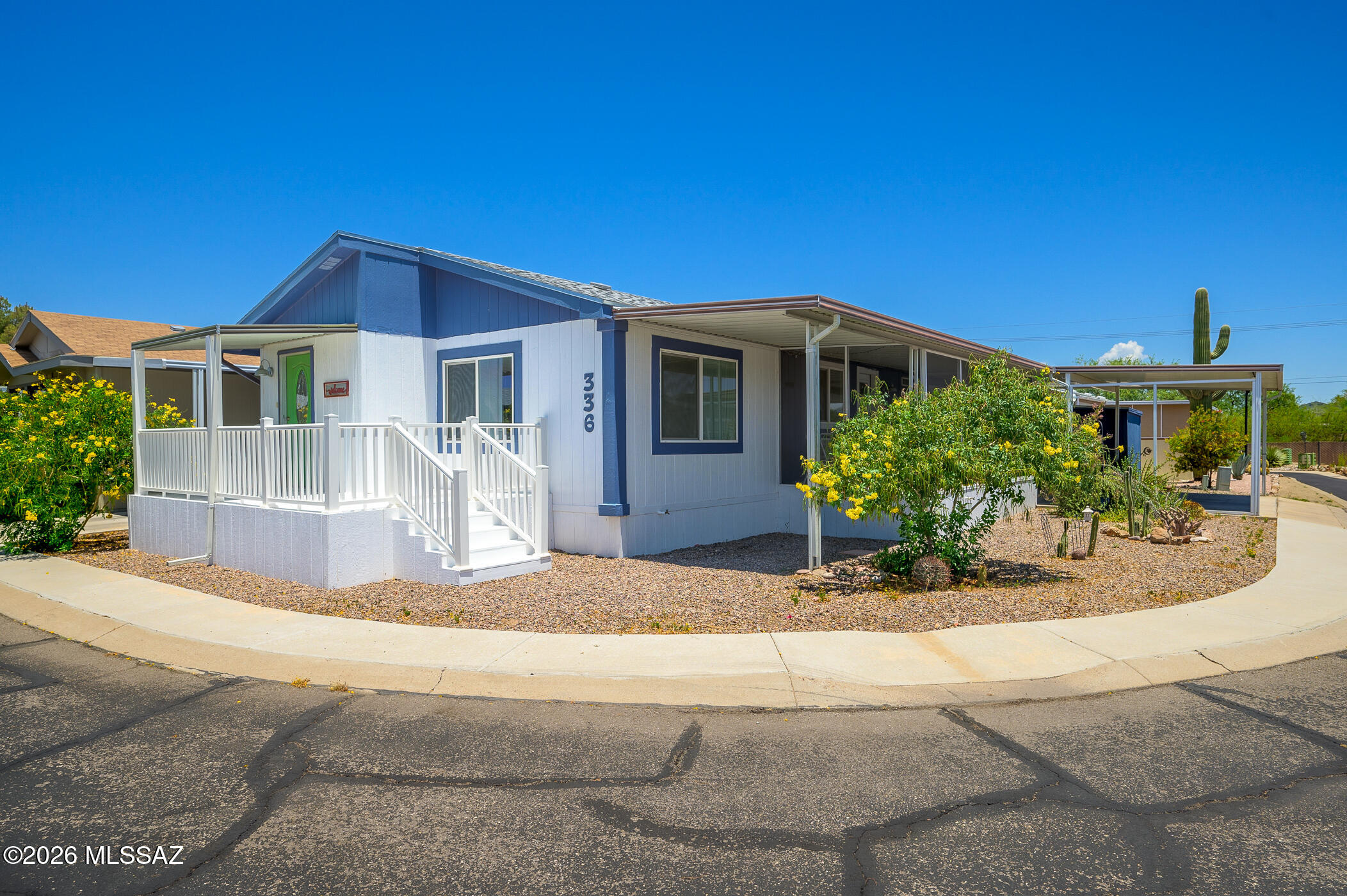Great home on a corner lot in the 55+ Trails West community that offers 2 pools/spa and a great Rec Center. See docs tab for more info! This manufactured home has some important unique and desired properties: 2 car carport where most have only 1 extended; New roof as of 2025!; New screens on AZ room; New front porch as of 2025; Both bathrooms have been updated over the last two years; New Washer and Dryer; New Fridge; and 2 sheds on each side of the home! Butcher block island in kitchen with Corian counters and attractive backsplash. Windows were updated over the last couple of years as well.