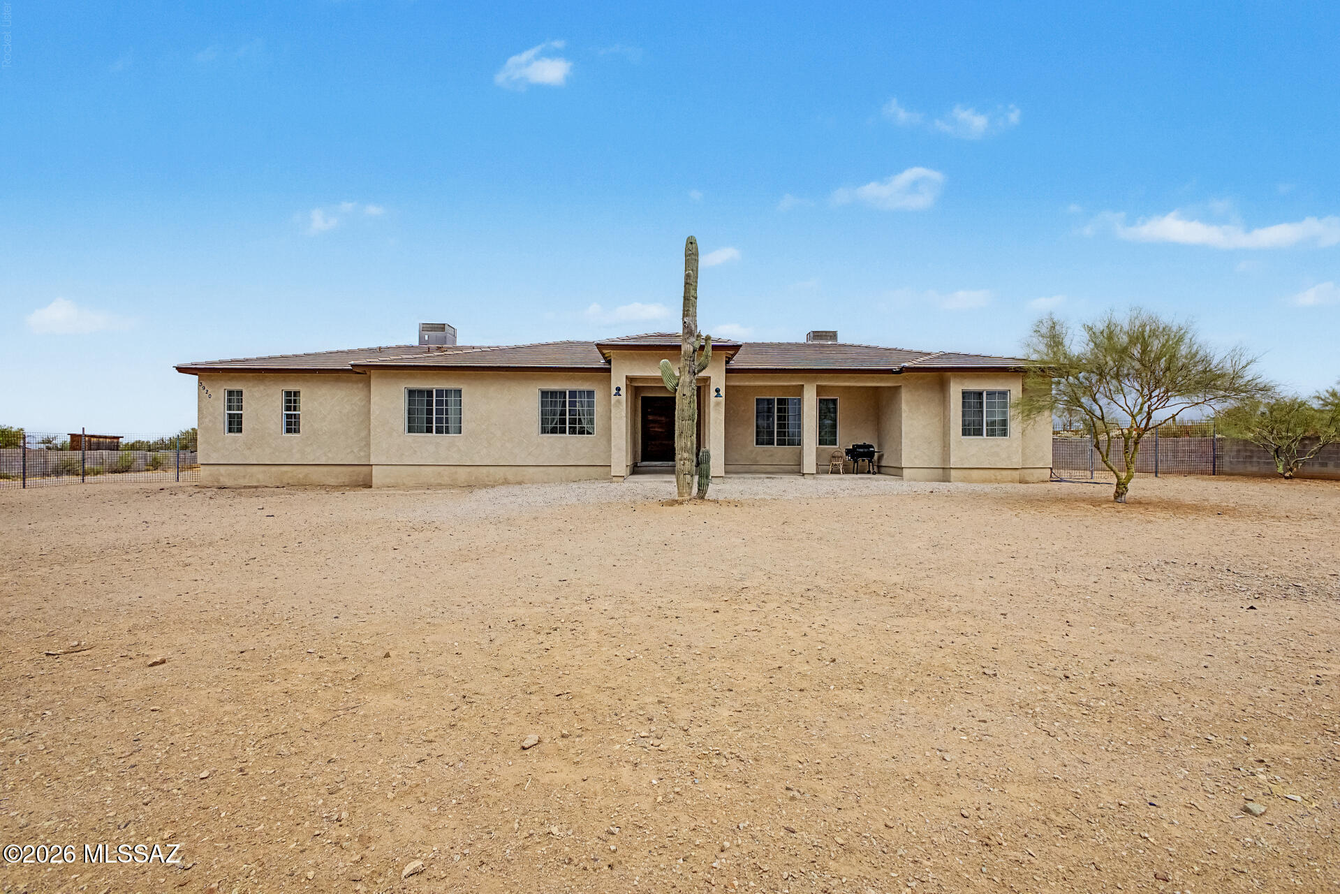 Custom Southwest home set on over an acre with beautiful desert views, privacy, and room to enjoy Arizona living at its best. This 5-bedroom, 3-bath property offers more than 3,000 sq ft of living space, featuring a split floor plan, custom cedar doors, high-quality doors throughout the home, upgraded kitchen cabinets, 10-foot ceilings, an open floor plan, and energy-efficient construction. Designed for comfort and functionality, this home offers the perfect setting for entertaining, relaxing, and taking in the peaceful surrounding landscape. A rare Tucson opportunity with space, style, and timeless desert character.