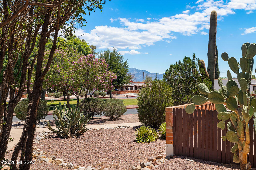 Mountain views from the front patio and the rare advantage of GVR available yet not required set this fully furnished Villas East villa apart. Located in a tranquil setting, this one-bedroom unit offers abundant kitchen cabinetry, a full-size gas range, and neutral tile flooring in the kitchen, living area, and bath for easy maintenance. The HOA adds exceptional value by covering HVAC, roof, water, sewer, trash, pest control, and more. With an on-site pool and a central Green Valley location, this villa is ideal as a full-time residence, seasonal retreat, or easy lock-and-leave getaway.