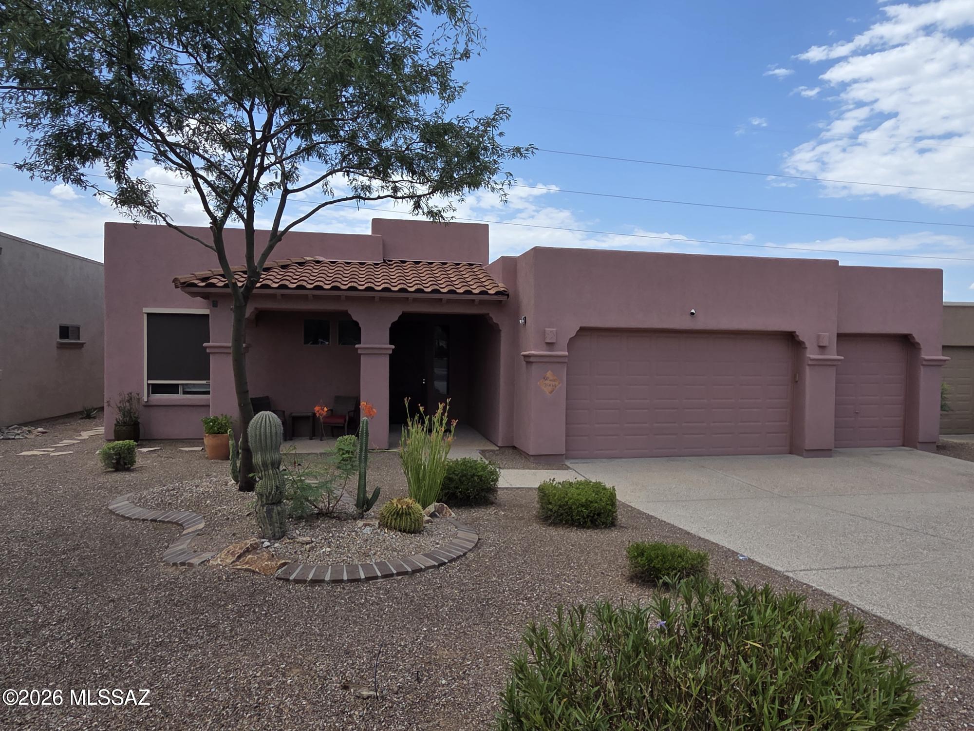 Great house in a close in neighborhood on a large lot with mountain views. Open floor plan with grand entryway. Large kitchen with loads of cabinets, granite counters, undermount sink, built in desk space & upgraded stainless appliances. Gas fireplace in the great room. Spacious master with jetted tub & separate shower, dual sinks & large master closet with built-ins. Flexible floor plan with space for either a formal dining or a home office...you choose. Second and third bedrooms are split from master bedroom and share the hall bath. Fresh interior paint, recently installed deluxe window coverings and black out shutters. Multiple ceiling fans throughout. Big back yard with a covered patio, built-in firepit with seating. Oversized 3 car garage with exposed aggregate concrete driveway.