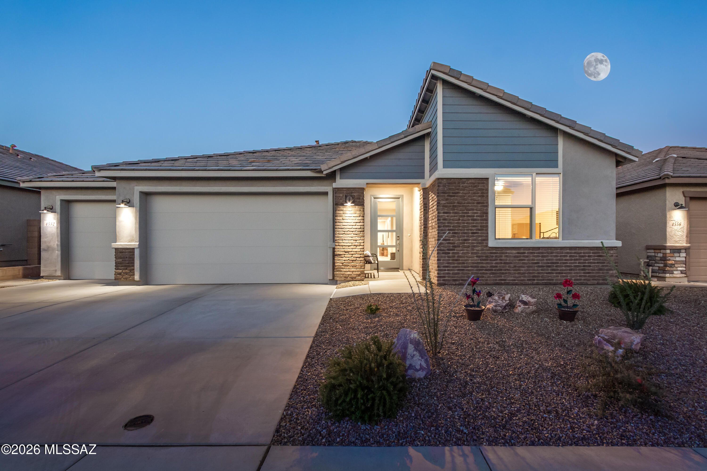 Experience modern Arizona living in this nearly new Mattamy-built Blush model located in the sought-after Montelena
community. Offering 2,471SF of thoughtfully designed living space, this one-year-old home features an open great room concept perfect for both everyday living & entertaining. The spacious floor plan includes 3BR, 2.5BA + versatile study/office ideal for working from home or creating a private retreat. The beautifully appointed kitchen features 42'' cabinets, quartz counters & large center island and flows seamlessly into the expansive great room & dining area, creating a bright & welcoming atmosphere. Step outside to enjoy the covered patio with desirable east-facing Catalina Mountain views -- the perfect setting for relaxing mornings and shaded afternoon entertaining. The professionally finished backyard showcases low-maintenance artificial turf, firepit and attractive brick pavers for easy outdoor living year-round. Additional highlights include a 3-car garage with epoxy flooring & mini-split, laundry room with utility sink,
contemporary finishes & the peace of mind that comes with owning a nearly new home. Combining comfort, style & scenic desert beauty, this exceptional Montelena residence is ready to impress.