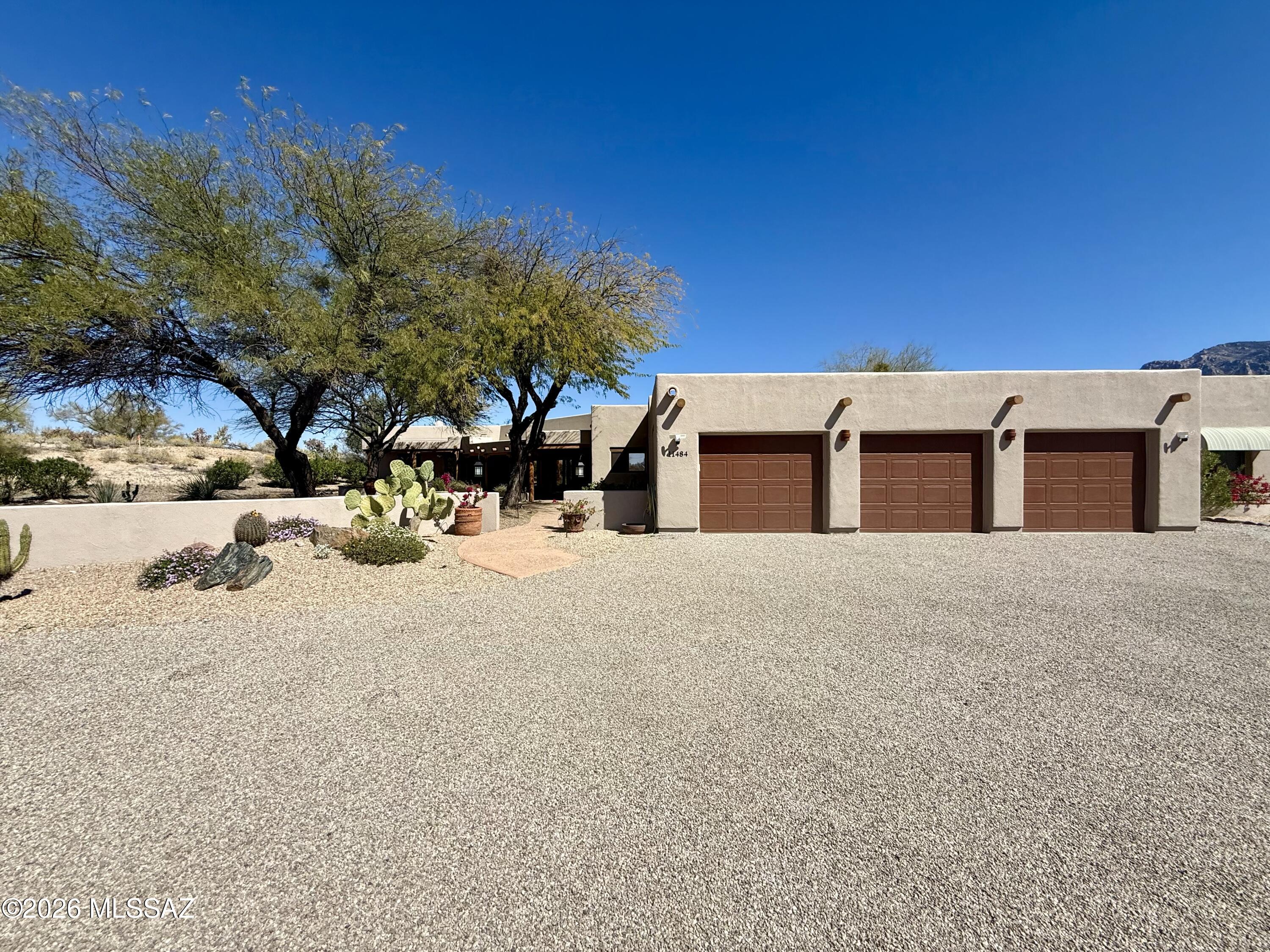 Not your typical rental. Experience the best of Oro Valley living on this spacious 1.27-acre lot with no HOA! Enjoy stunning, unobstructed views of Pusch Ridge from your own backyard. The main Santa-Fe style home offers 3 bedrooms and 2.5 bathrooms across 3,260 sq.ft., with wood ceilings in the great room, dining area, and kitchen. Recent upgrades include luxury plank vinyl flooring throughout (excluding bedrooms), and a chef's kitchen featuring a new induction cooktop, dishwasher, and range hood, plus a cozy breakfast nook with a fireplace.The primary suite is a true retreat with a jetted tub, fireplace, and an oversized closet with bonus storage space. Need extra space? A charming 1-bedroom, 1-bath Casita is perfect for a home office, studio, or extended family. It has a full kitchen and washer dryer hook-ups. The backyard is a private oasis with artificial turf, a waterfall, fruit trees, and an oversized covered patio--perfect for relaxing or entertaining. 3 car garage. Horse property featuring 3 stalls, with the owner open to allowing resident use.
Located next to a conservation area with riding trails, this home is perfect for outdoor enthusiasts who want peace, space, and functionality all in one amazing Oro Valley location.