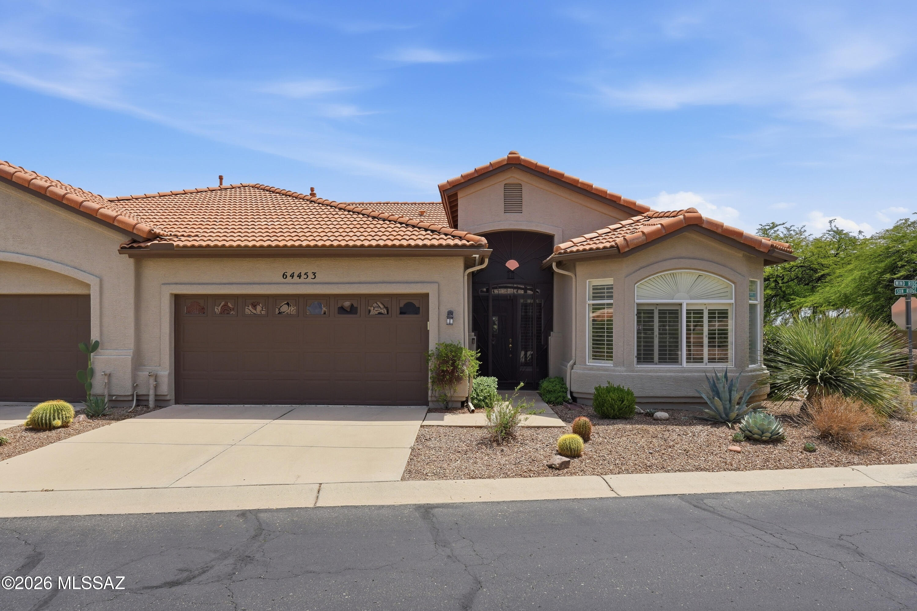 Absolutely beautiful, completely remodeled villa in SaddleBrooke HOA#1 with lovely mountain views! Kitchen features granite counters, stainless appliances, new refrigerator, white cabinets w/pull outs. Enjoy cozy evenings in the great room by the electric fireplace w/custom white surround. White wood shutters enhance every window & door. Split bedroom plan w/bay window in guest suite, plus stunning guest bath w/quartz counters, gorgeous shower, new light fixture & mirror. Exquisitely updated master suite features new paint, slider to patio, 2 closets & beautiful bathroom. Front door enclosure w/wrought iron gate. Delightful extended patio w/pavers, artificial turf, TV, ceiling fan, sunshades, gas outlet & those great views! All furniture available for sale on separate bill,