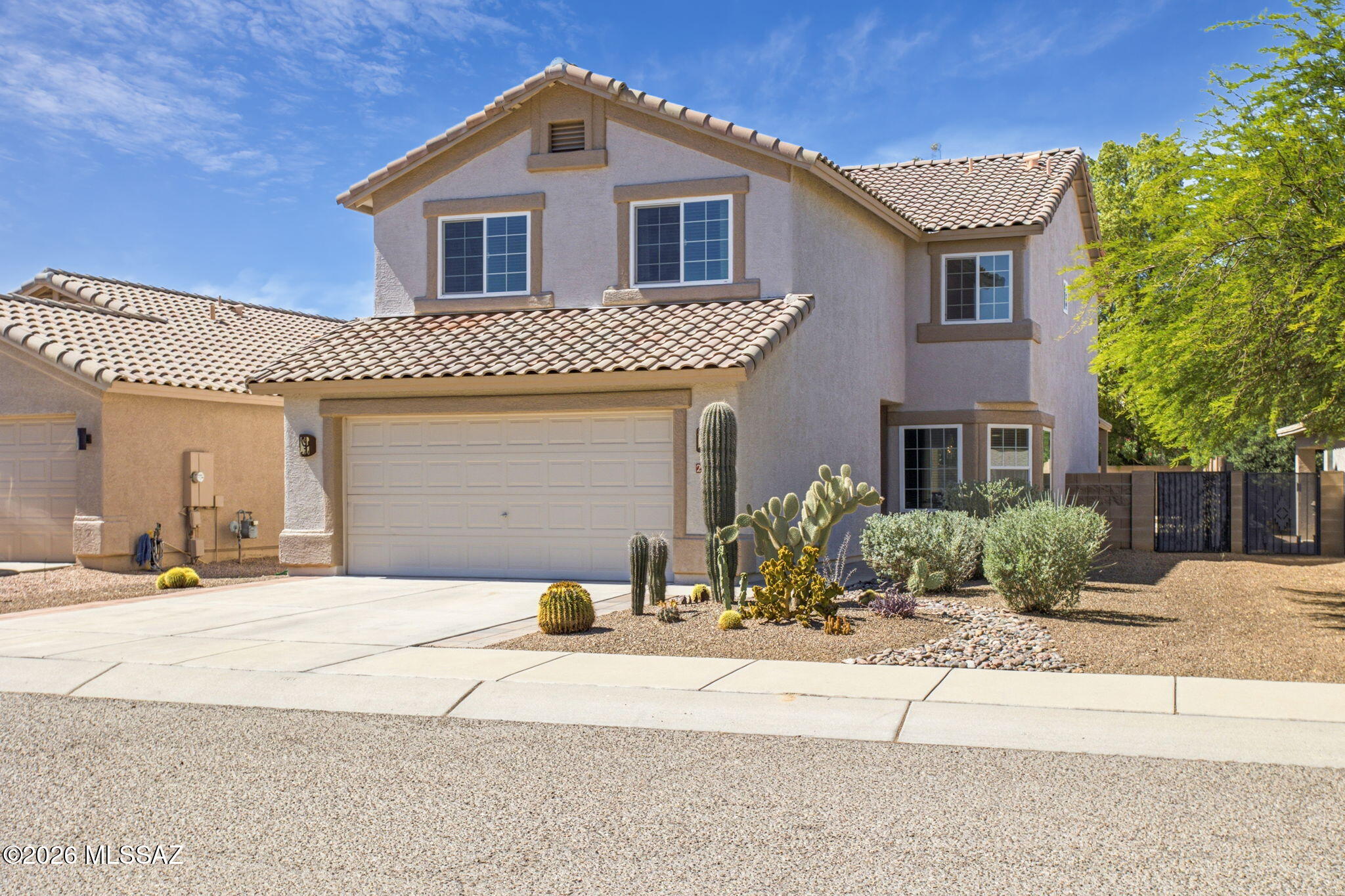 Located in the desirable NW community, the Bluffs, this move in ready 4BD/2.5BA home showcases pride of ownership throughout! Functional 2-story layout, this home features updated flooring and fixtures, a spacious living/great room with elevated ceilings, and a dining nook. Upstairs offers a unique separate guest area with 2 bedrooms and a full bath--perfect for guests, kids, or multi-gen living. The spacious primary suite includes a large walk-in closet and dual sink vanity. Enjoy your private backyard oasis with a sparkling Pebble Tec pool, covered patio, low-maintenance landscaping, and tranquil fountain. Complete with a 2-car garage with epoxy floors! Community features a park, basketball court, baseball field & close to shopping, dining, and amenities!