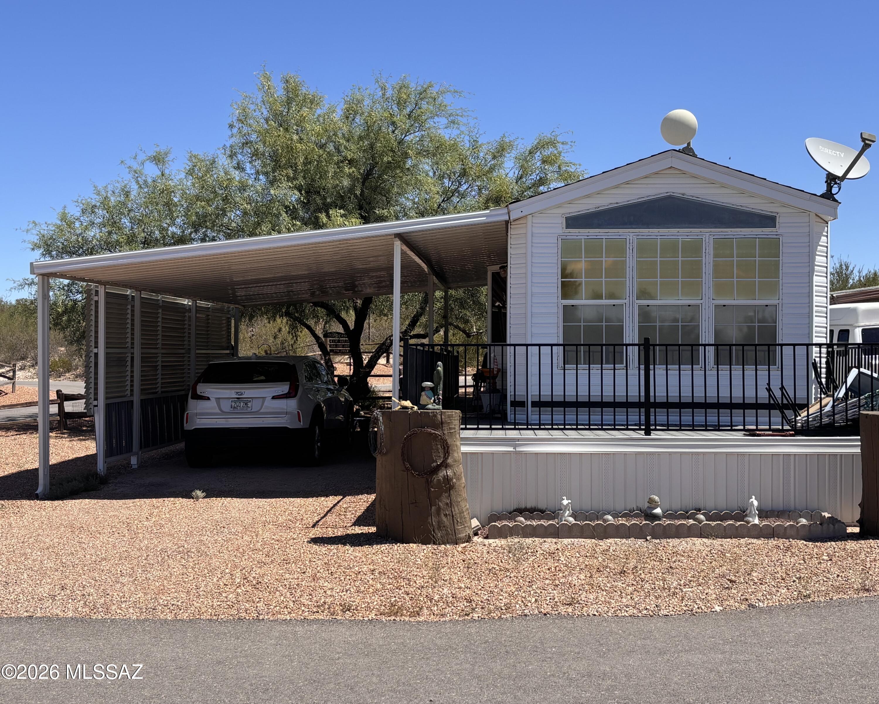 Your desert getaway is calling! This beautifully renovated park model offers stunning Whetstone Mountain & San Pedro Valley views-perfect for morning coffee, sunset unwinding, and relaxed outdoor living. Covered parking and 8x12 shed for extra storage. Located in pet friendly Lakes of St David RV resort, a true oasis in the desert. Enjoy easy resort days, saltwater pool & hot tub, exercise room, laundry, clubhouse, hiking trails, catch-and-release fishing and community events. This is a leasehold park model in RV resort. Lot rent is $7,080/ year, which includes artesian well water, sewer, trash, free Wi-Fi and use of the resort facilities.