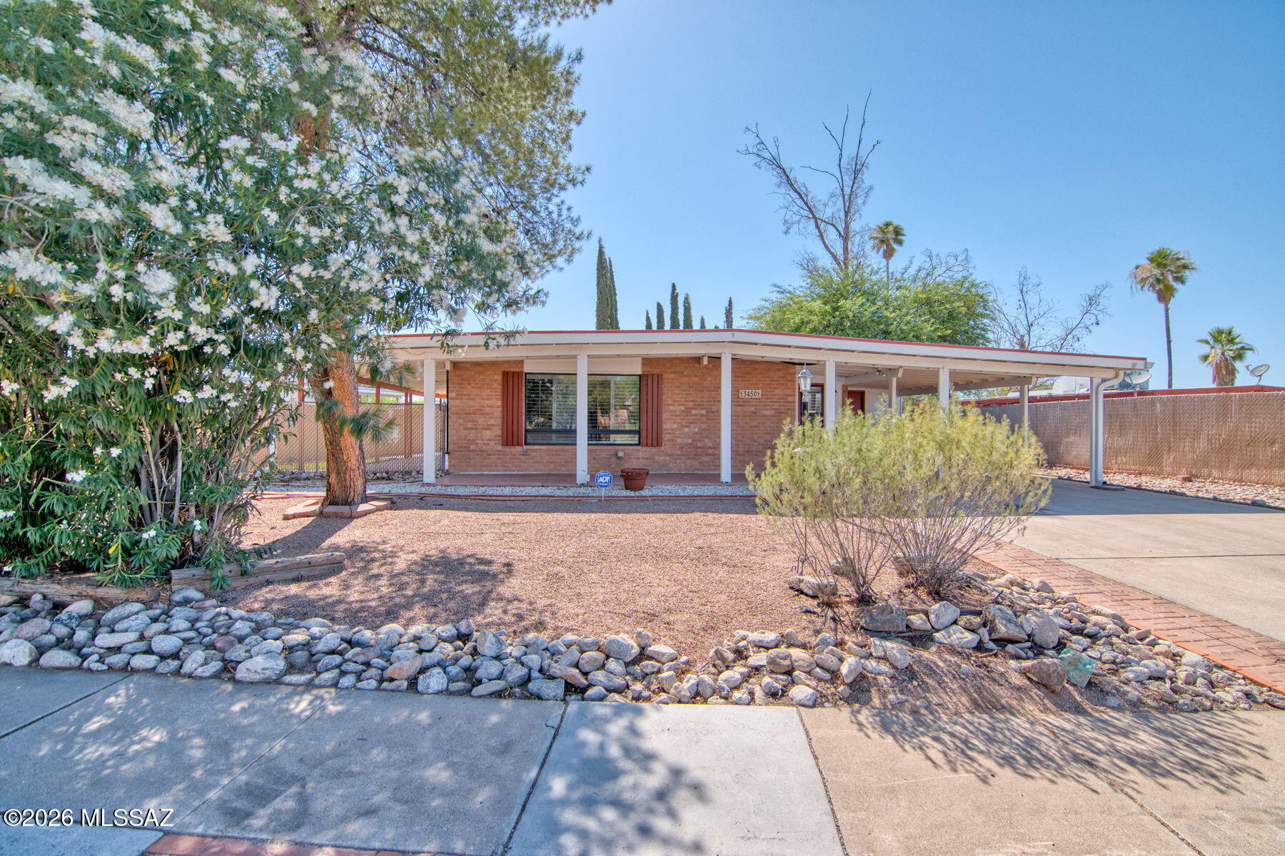 Range priced $260,000-$270,000! FHA ok! Cute, clean and move in ready! This home has amazing curb appeal and if you love outdoor living spaces this is the house for you. Large front patio and huge side patio perfect for entertaining and hanging with friend and family. Red brick mid-century home has fresh paing and carpet quartz counter tops, updated primary bathroom and a large lot. This home is a great value and right across the street from a cool neighborhood park. Easy commute to DM. Owner/Agent