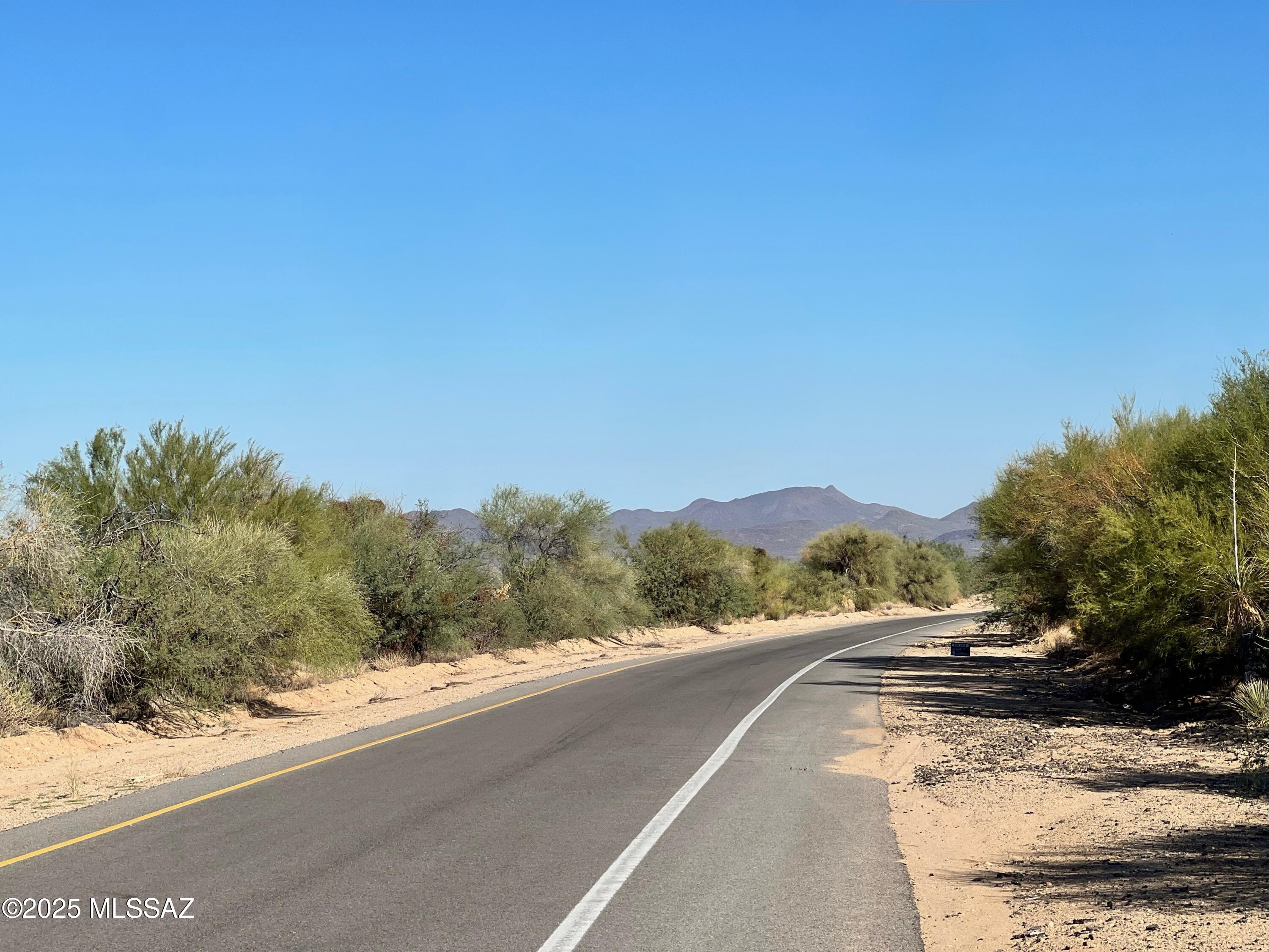 3 LOTS TOTAL. Build your desert dream retreat! Looking for space, privacy and endless possibilities? These three 1+ acre lots are ready for your vision. Design the home you've always wanted -plenty of room for outdoor living, toys, or simply soaking up the wide-open skies. Peaceful setting with desert beauty all around. Owner will carry terms negotiable. Your desert lifestyle starts here. Don't Miss this opportunity! Buyer to verify all MLS info. 

3 lots total listing includes lots: 15954 W Diamond Bell Ranch RD. 301-65-4750, 15946 W Diamond Bell Ranch Rd. 301-65-4740 & 15938 W Diamond Bell Ranch Rd.  301-65-4730.