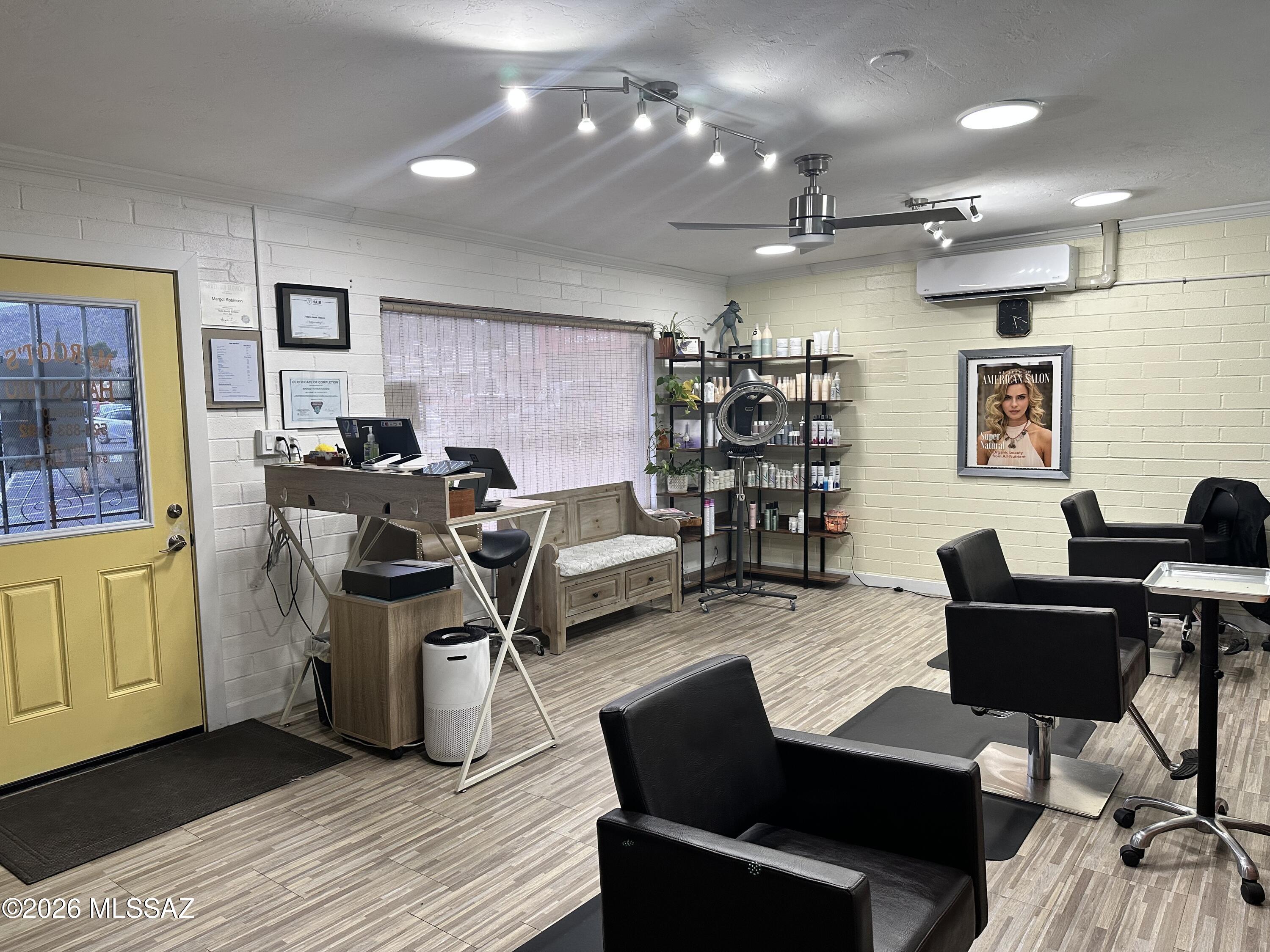 This commercial building has great flexibility in uses available with B2 zoning and a prime location within the primary shopping center for Tucson Estates and surrounding high growth residential area.  Currently operating as a well established and profitable hair salon.  Extra income from contract stylists and leased space with 3+ years remaining in the lease term.  There is ample common parking with easy access to the Studio entrance.  Call LA, Brad, for more details 520-429-7918.