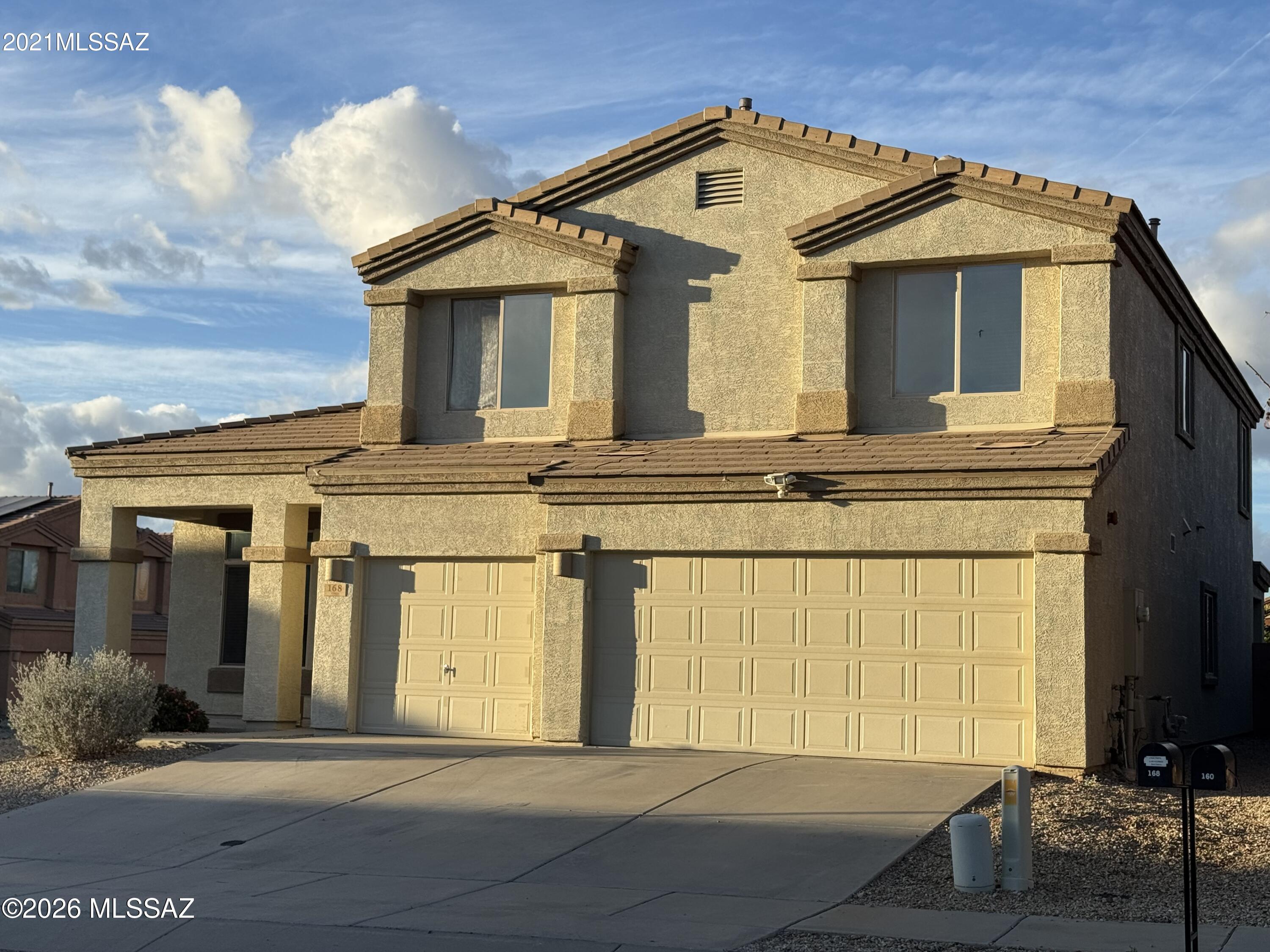 Welcome to this beautiful two-story home located in Corona De Tucson!  This spacious home features 5 bedrooms and 3 full bathrooms, offering plenty of room for family living, guests, or a home office. The modern kitchen boasts elegant black granite countertops, stainless steel appliances, and tall cherry cabinetry, providing both style and functionality.  The Kitchen also offers the convenience of both gas and electric hookups for the oven, giving flexibility for your cooking preferences.  The home has been freshly painted. Upstairs, the spacious master suite features a custom walk- in shower, providing relaxing retreat.  Step outside to beautifully maintained backyard, perfect for entertaining. Walking distance to Elementary and middle school.