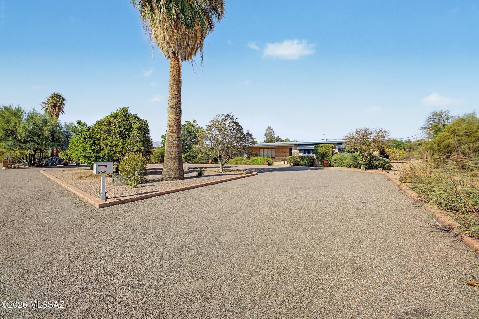 MCM Lovers look no further! Located in the historic Harold Bell Wright neighborhood & built by Karl Weise in 1959, this home has had only 2 owners and has been lovingly maintained and updated while still keeping true to Weise's vision. Situated on almost 3/4 of an acre with a pool, citrus trees and room to park your RV. Updates include a completely new roof, updated electrical, bathroom fans, solar screens in the spacious AZ room, solar tubes throughout, RO and owned water softener, new pool pump, neutral interior color with pops of fun colors in all 3 bathrooms. 4 bedrooms have replaced carpet with Marmoleum flooring to keep the MCM vibe. New poolside landscaping adds to the serene, park-like feel of the home. No HOA, Historic status.
1 of the sellers is a licensed AZ real estate agent